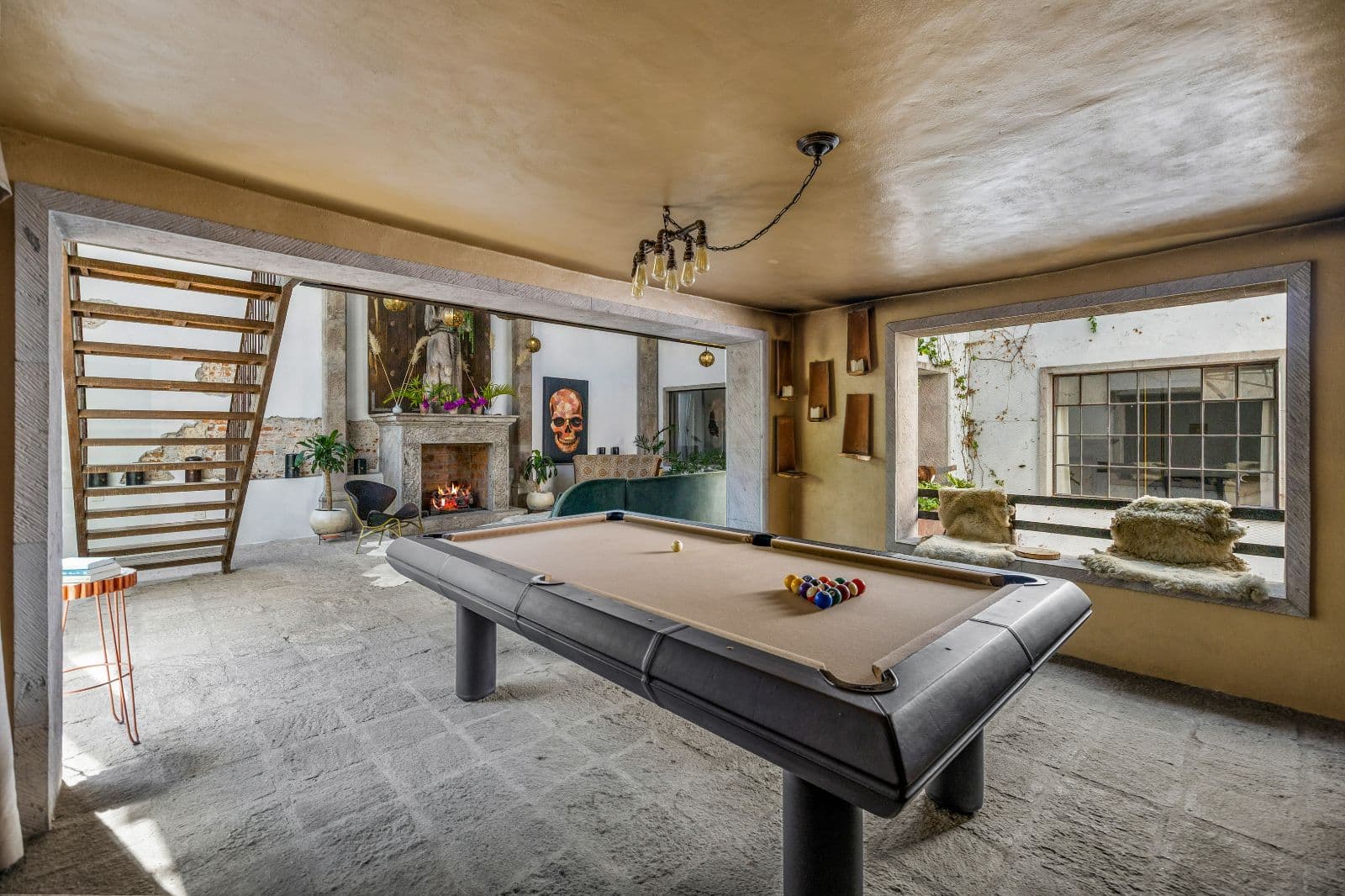 Casa Clae — Guadiana, San Miguel de Allende — photo 12 — sophisticated games room with fireplace views