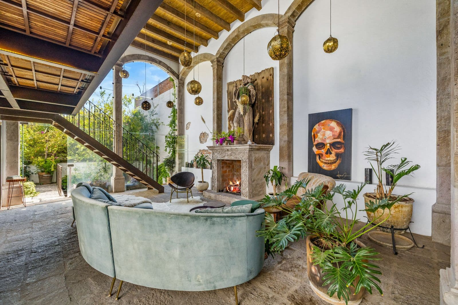 Casa Clae — Guadiana, San Miguel de Allende — photo 13 — soaring arches, curated art, lush living space
