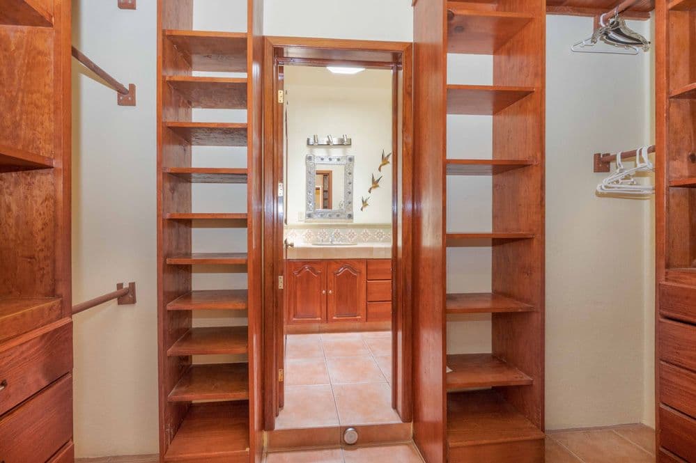 Casa Trueno — La Lejona, San Miguel de Allende — photo 17 — handcrafted wood closet, abundant storage