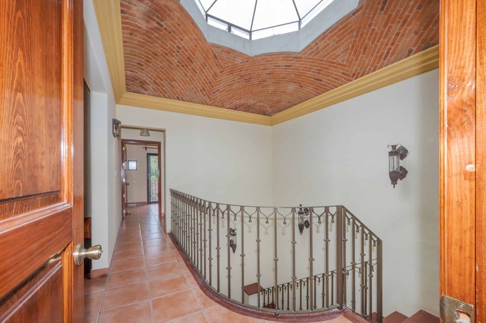 Casa Trueno — La Lejona, San Miguel de Allende — photo 13 — elegant skylit staircase, architectural gem