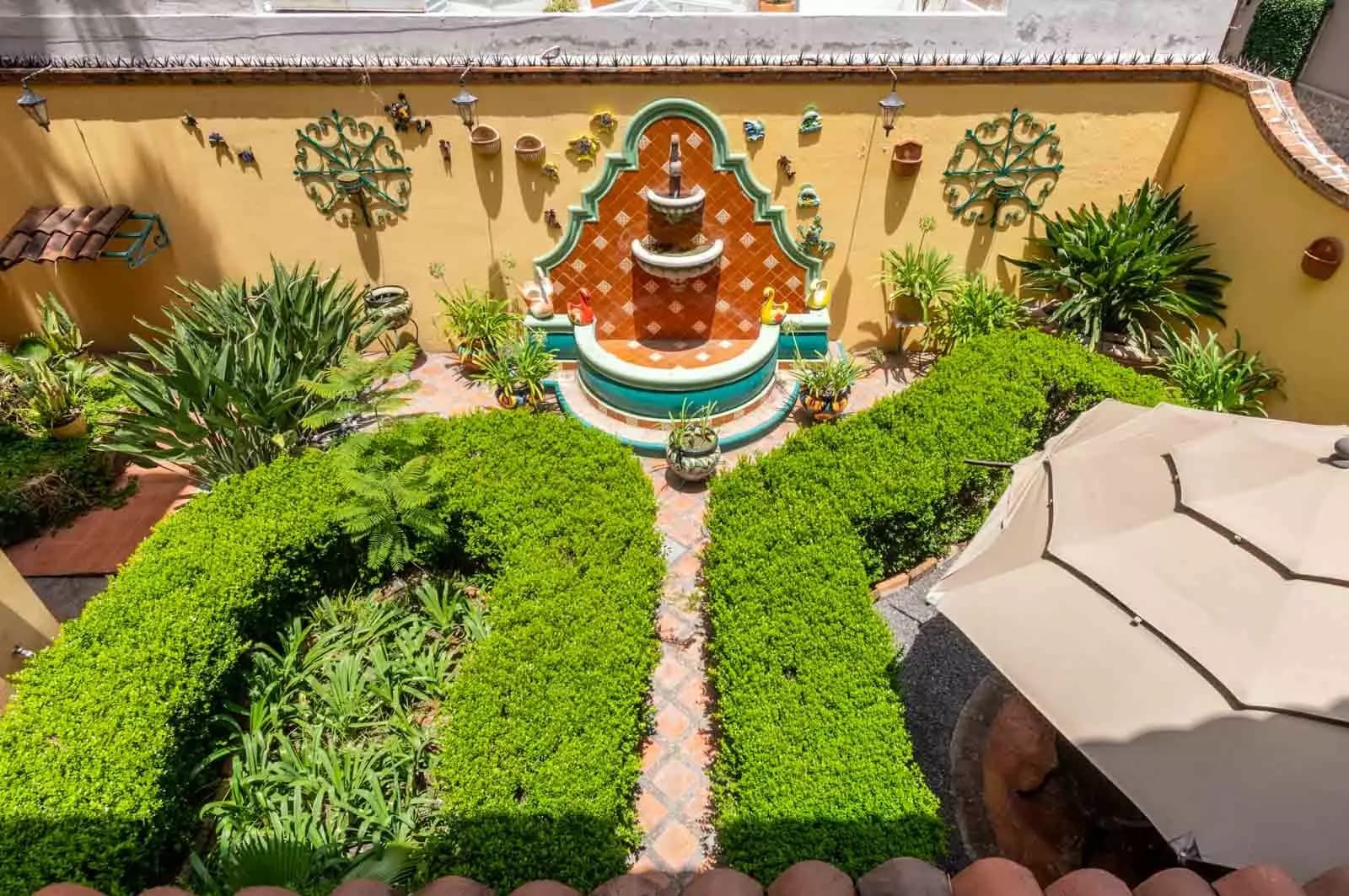 Agua Homes — Atascadero (Arcos de San Miguel), San Miguel de Allende — photo 15 — enchanting courtyard with talavera fountain