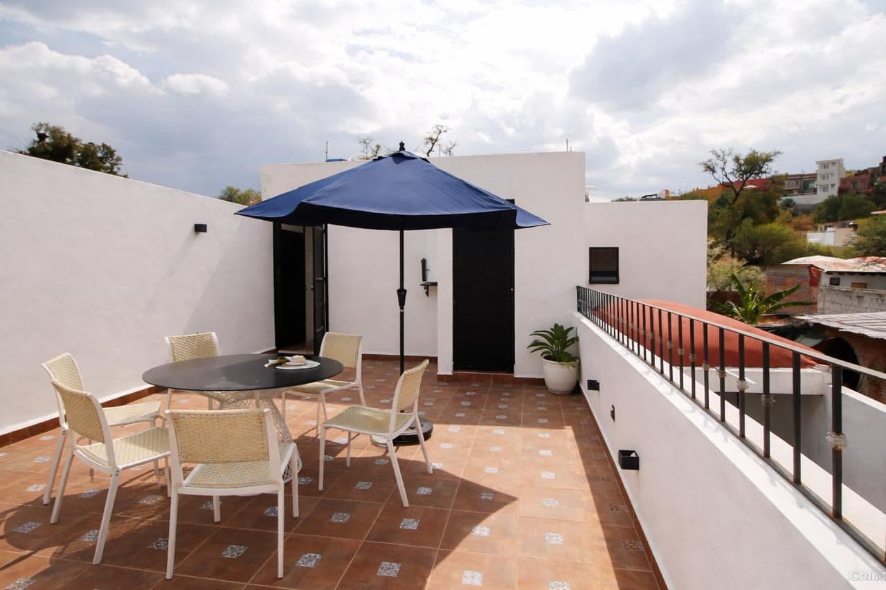 CASA DEL PUENTE DE UMARÁN — Centro, San Miguel de Allende — photo 6 — sophisticated rooftop terrace, panoramic views