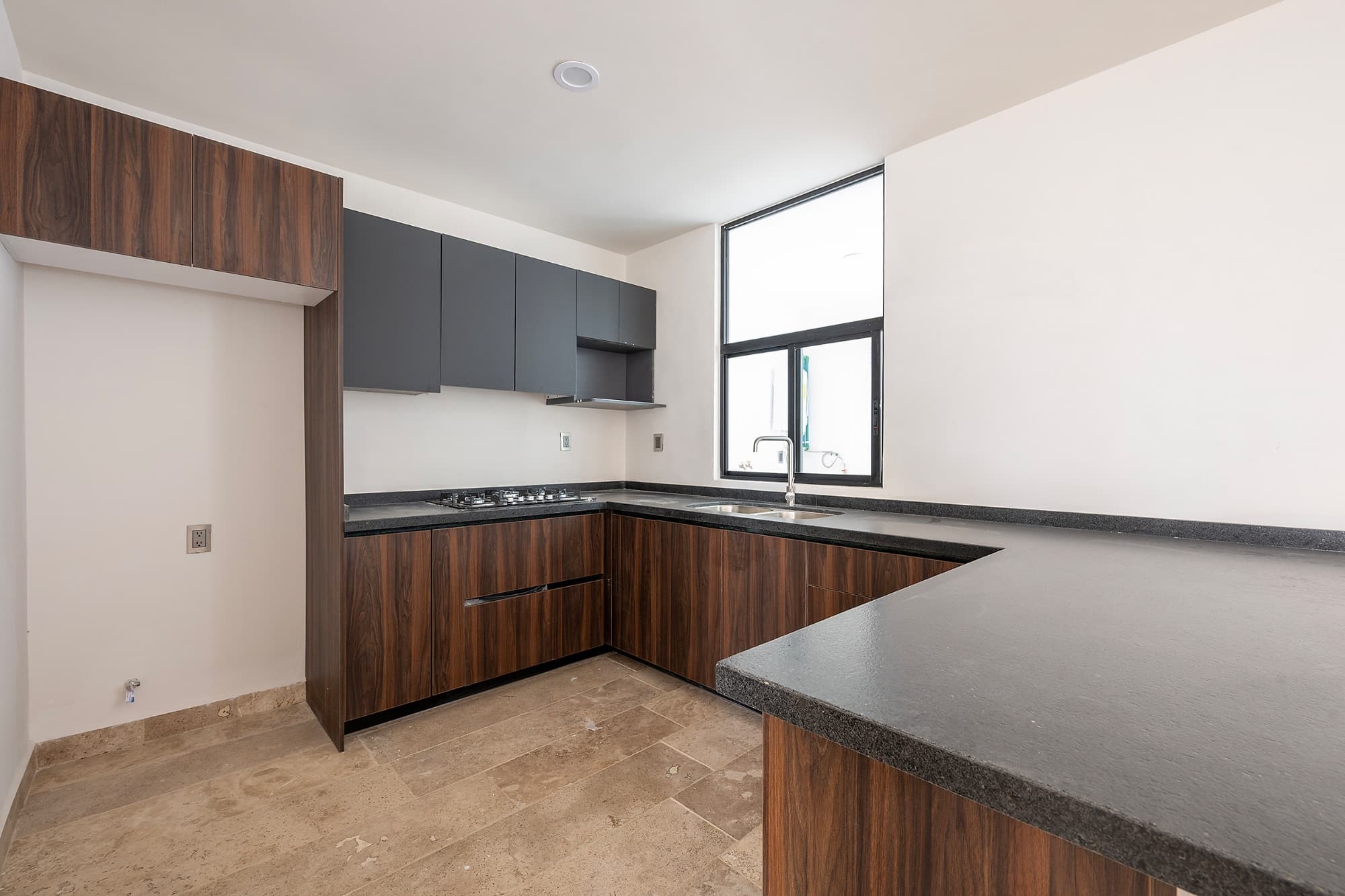 Rinconada del Pedregal / Modelo B — La Lejona, San Miguel de Allende — photo 7 — contemporary kitchen, natural light, sleek finishes