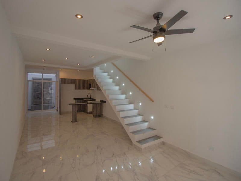 1952 Margarito Ledesma — San Miguel de Allende Centro, San Miguel de Allende — photo 21 — contemporary open-concept living with elegant stairs