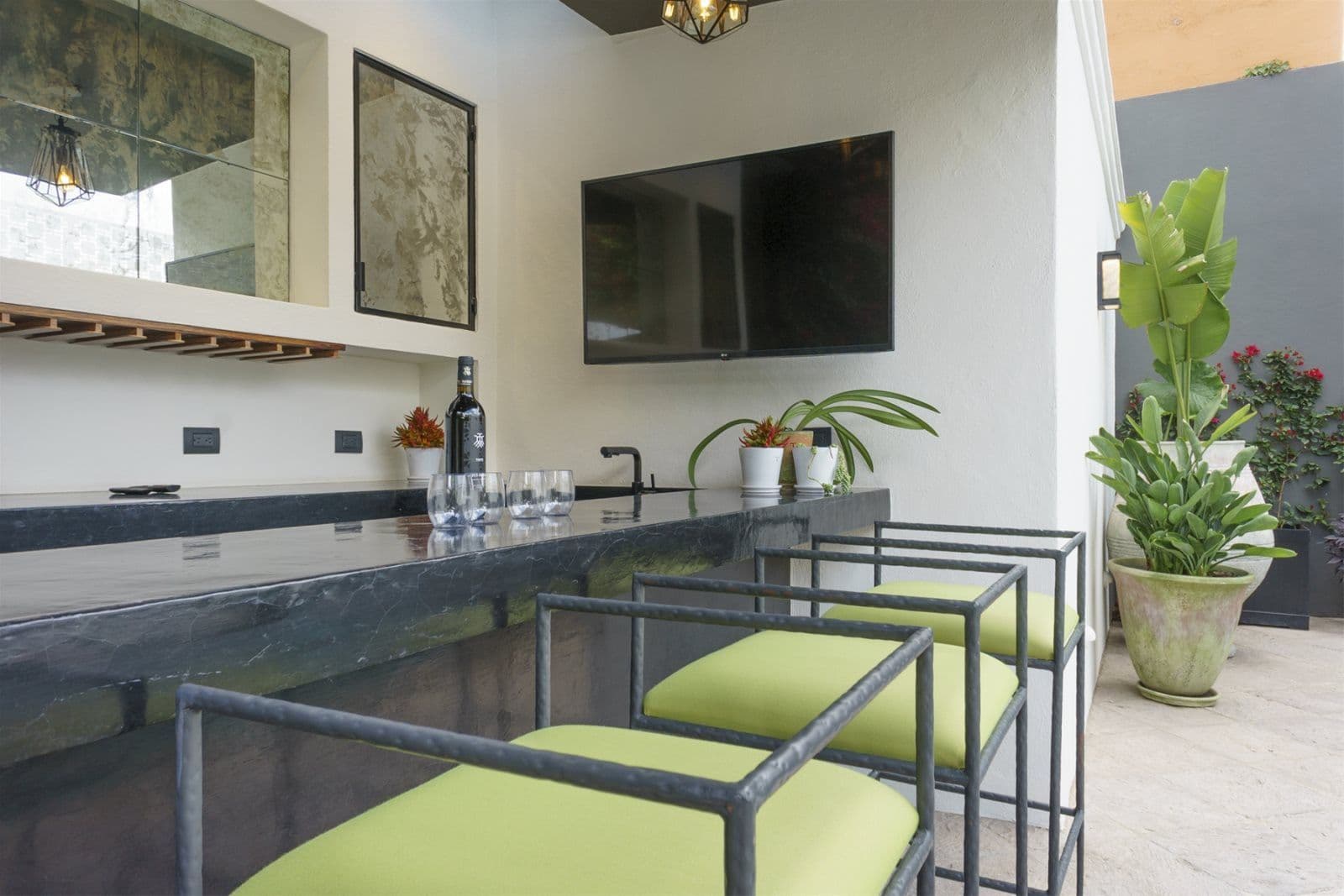 Casa Arcadia — Centro, San Miguel de Allende — photo 12 — contemporary kitchen with verdant courtyard views
