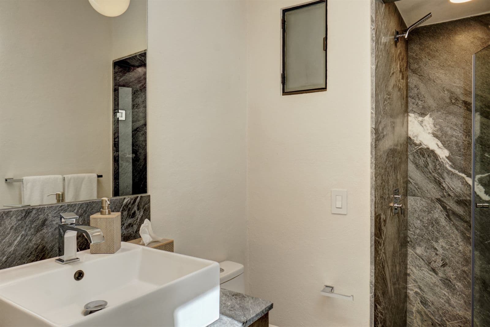 Casa Arcadia — Centro, San Miguel de Allende — photo 20 — spa-inspired ensuite with elegant stone finishes