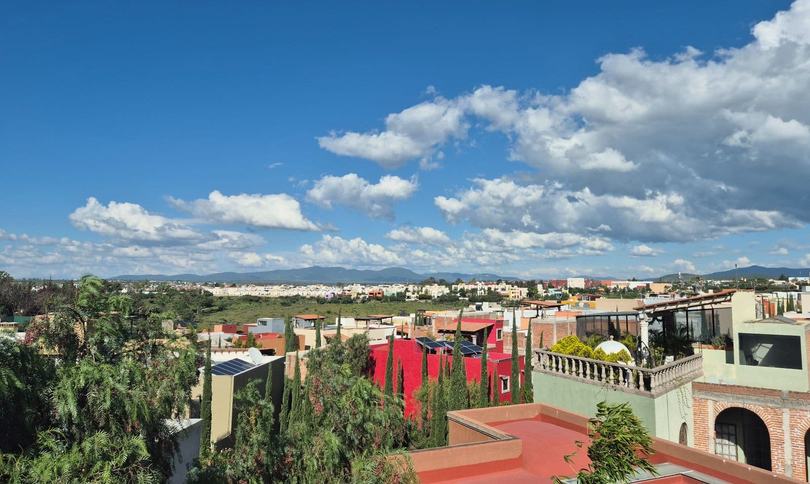 Casa de Llano — La Palmita, San Miguel de Allende — photo 11 — panoramic valley views, vibrant rooftop terrace