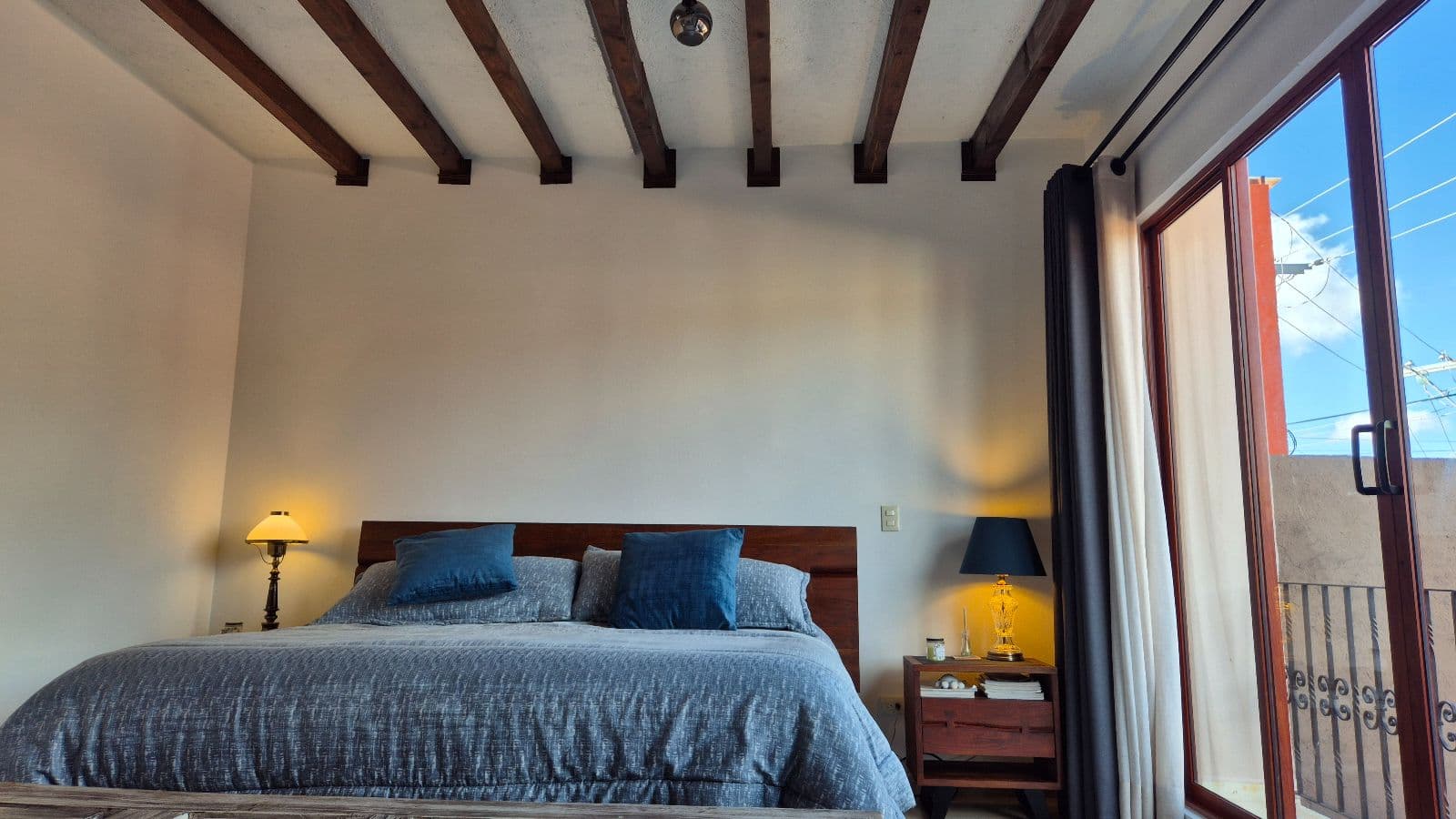 Casa de Llano — La Palmita, San Miguel de Allende — photo 8 — serene bedroom with skyline views