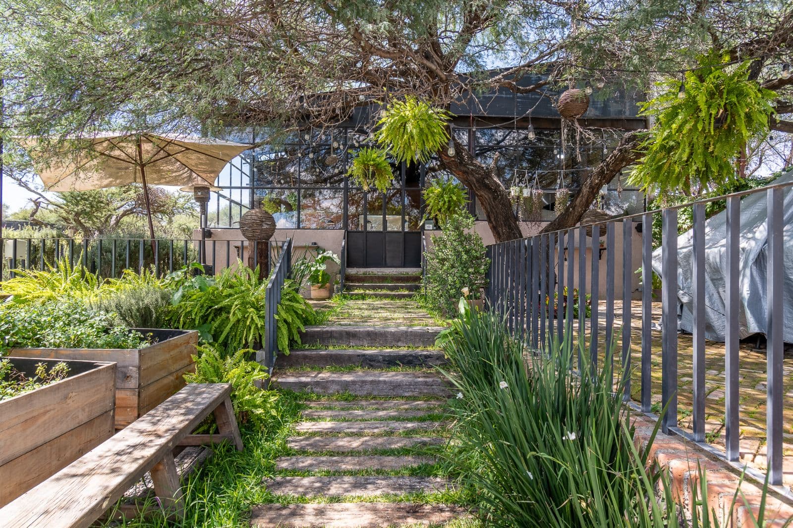 Cielo y Tierra — El Cortijo, San Miguel de Allende — photo 9 — lush garden sanctuary, mature shade trees