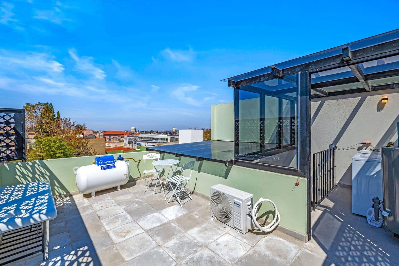 CASAS ANGEL & ANGELITO — La Lejona, San Miguel de Allende — photo 25 — sophisticated rooftop terrace with panoramic vistas
