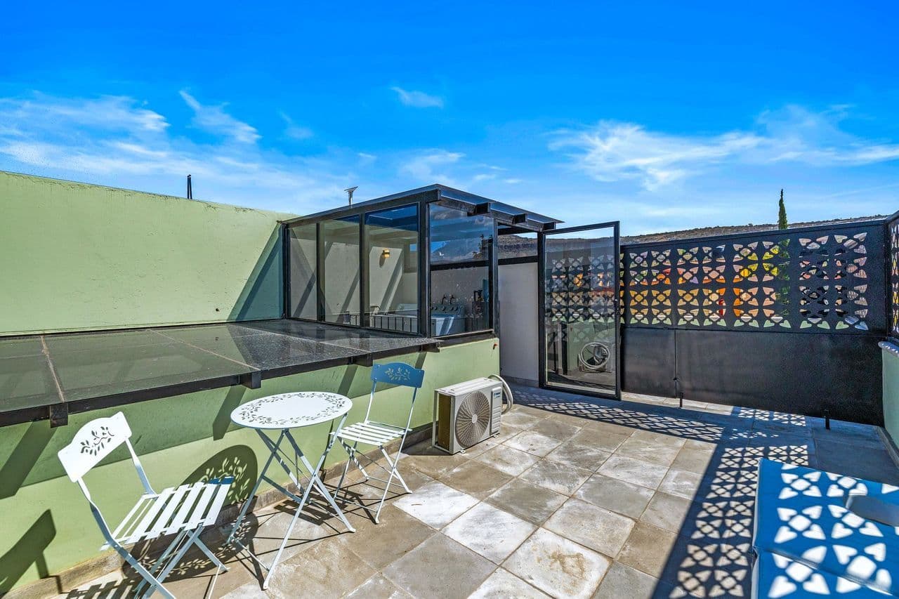 CASAS ANGEL & ANGELITO — La Lejona, San Miguel de Allende — photo 26 — expansive rooftop terrace, panoramic valley views