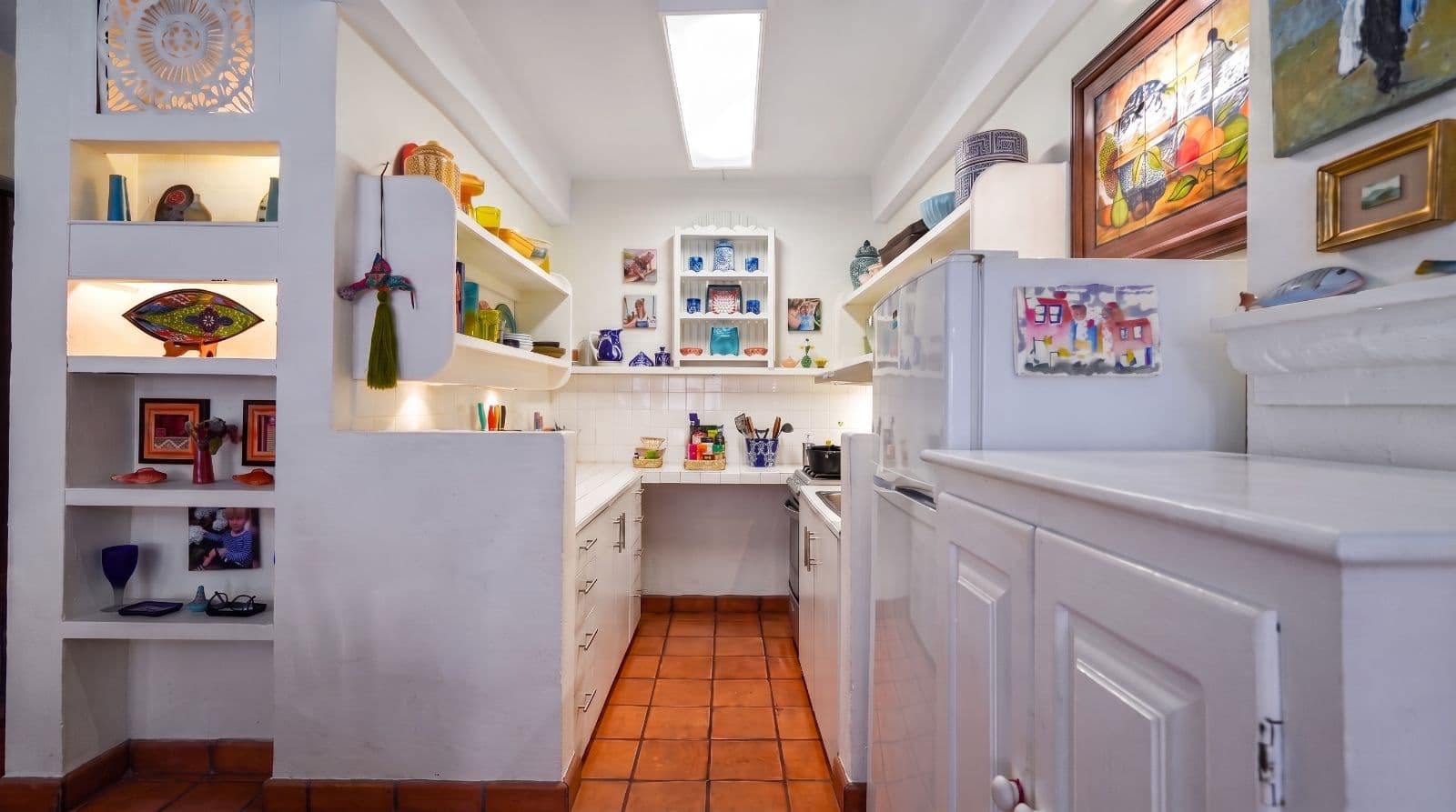 Condo Lelé — Centro, San Miguel de Allende — photo 3 — artfully curated kitchen with abundant natural light