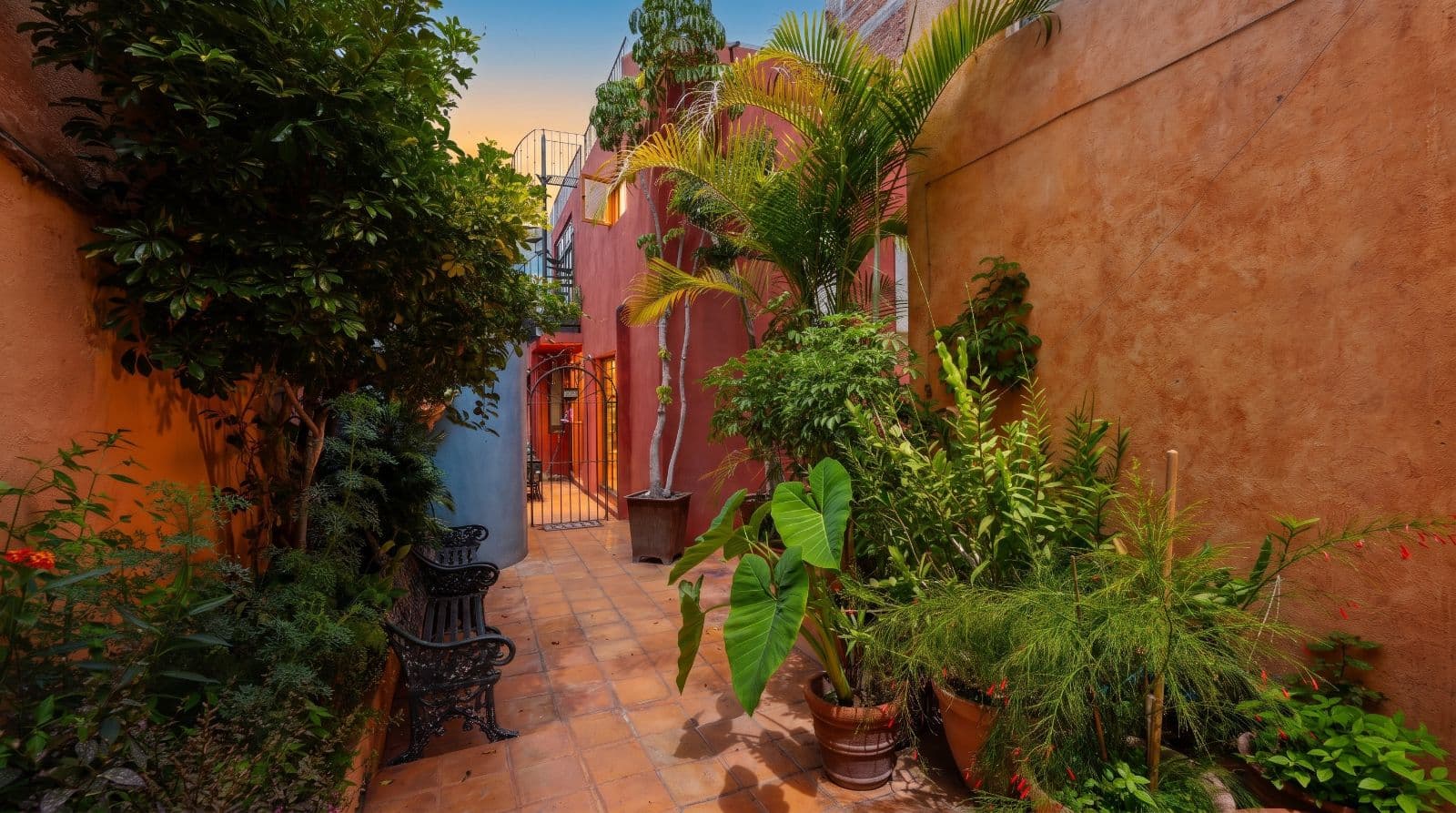 Condo Lelé — Centro, San Miguel de Allende — photo 22 — enchanting courtyard with lush tropical gardens