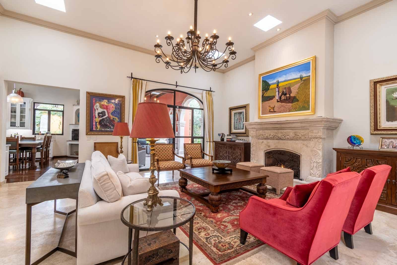 Casa Cosmati — Atascadero (Arcos de San Miguel), San Miguel de Allende — photo 12 — elegant living room, soaring ceilings, fireplace