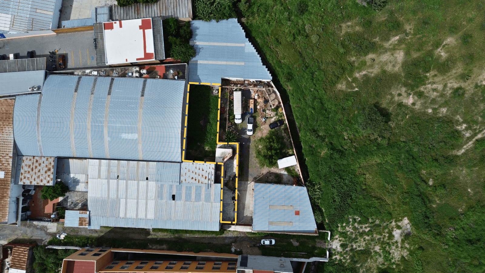 Opportunity Land Near City Market — Las Brisas, San Miguel de Allende — photo 2 — charming industrial compound, verdant potential