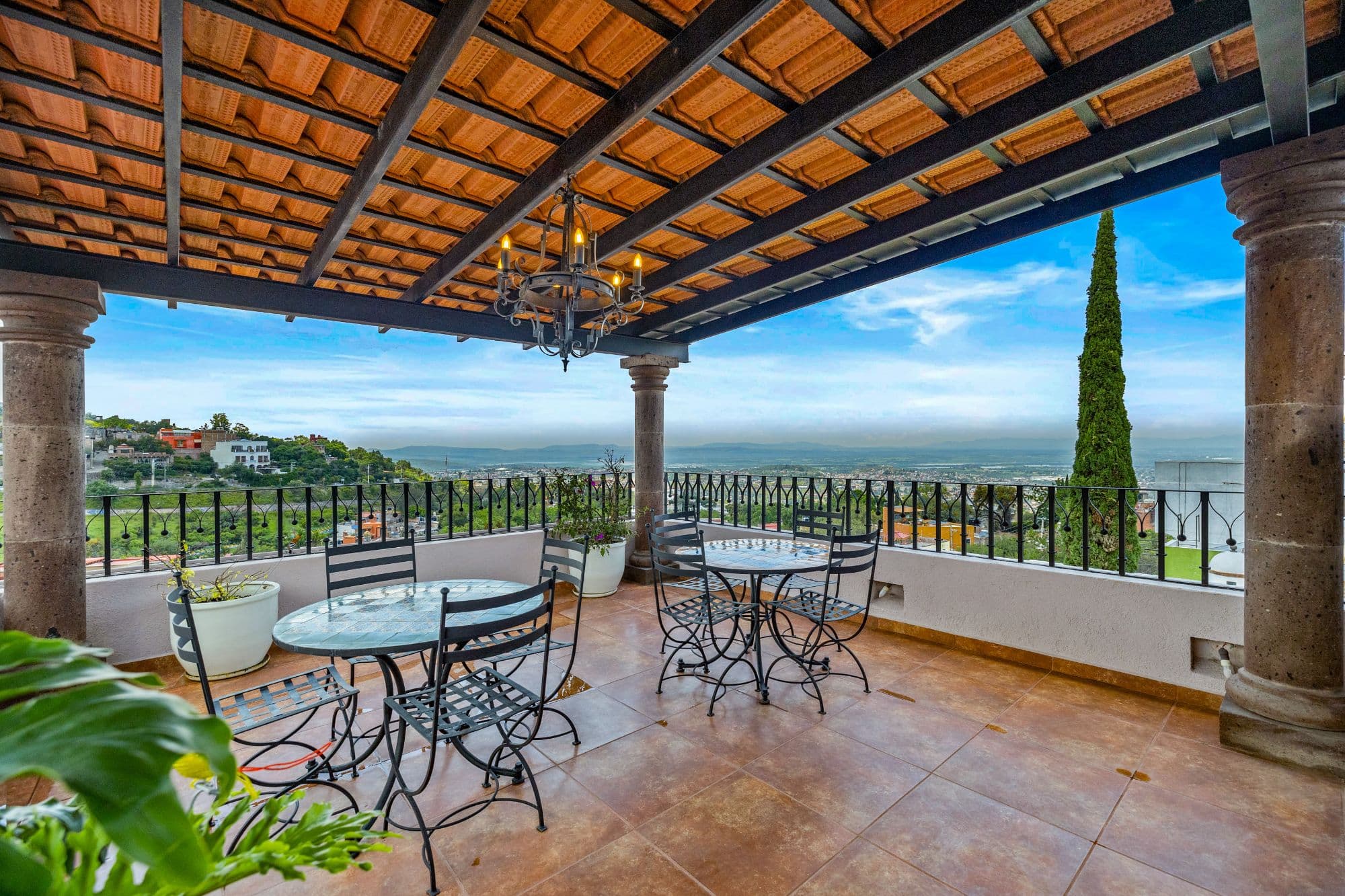 CASA MEZQUITE, SALIDA REAL A QUERÉTARO — Centro, San Miguel de Allende — photo 5 — panoramic valley views, elegant covered terrace