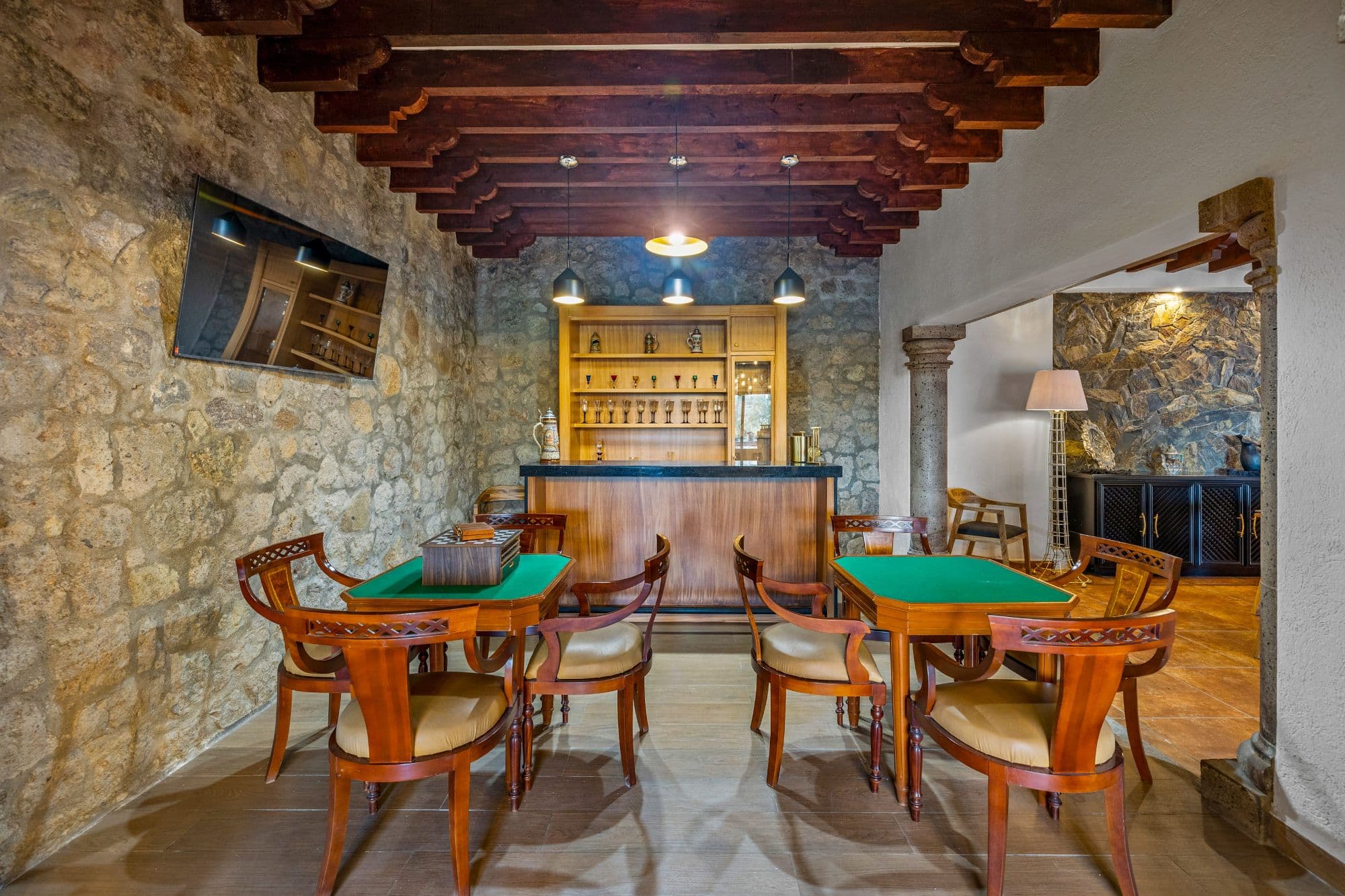 CASA MEZQUITE, SALIDA REAL A QUERÉTARO — Centro, San Miguel de Allende — photo 8 — elegant game room, sophisticated entertaining space
