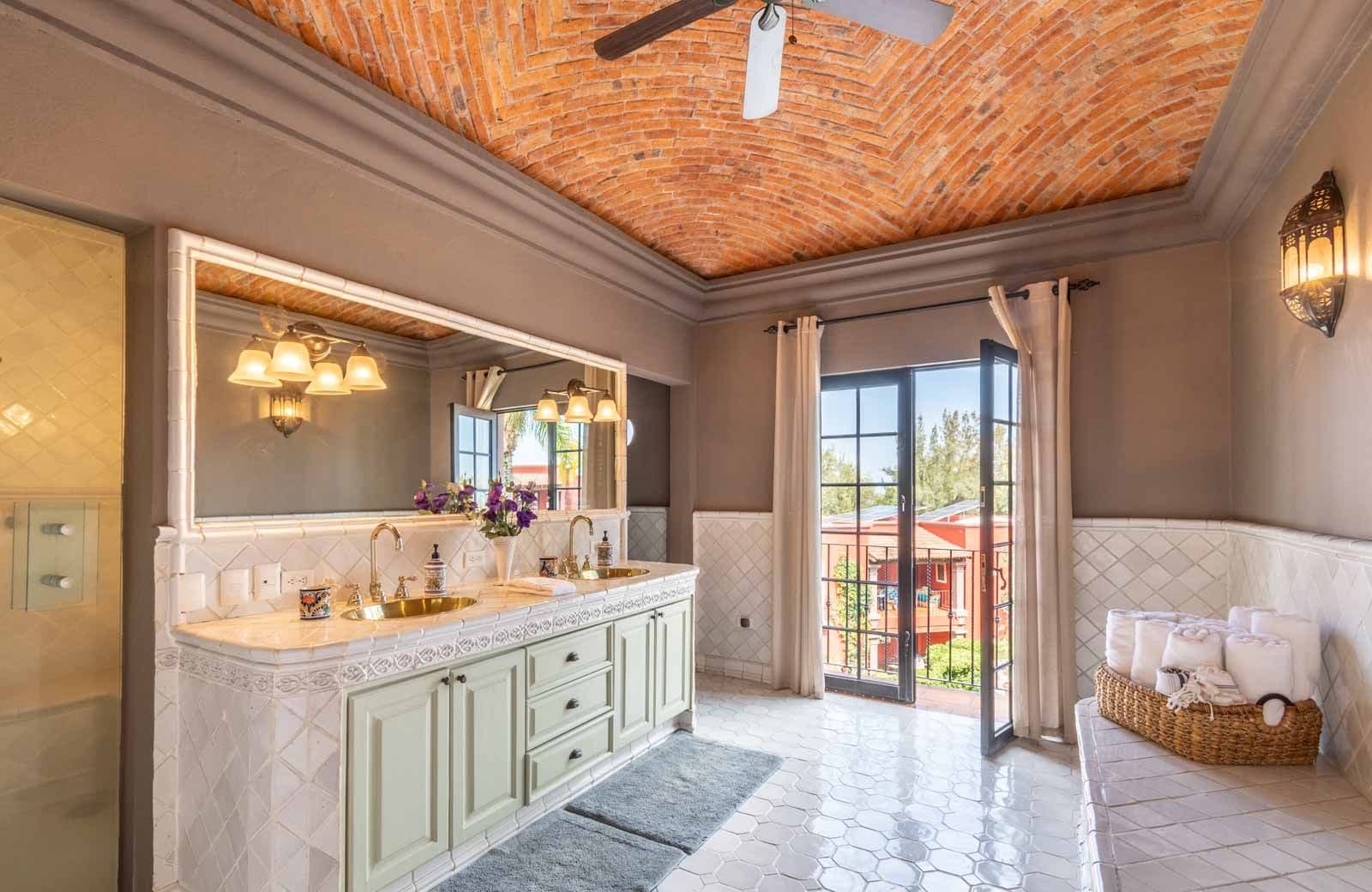 Casa Suerte — Balcones, San Miguel de Allende — photo 19 — spa-like master bath with breathtaking views