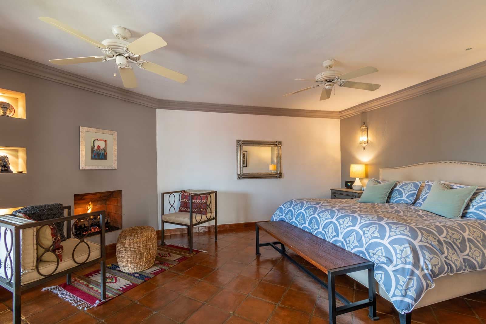 Casa Suerte — Balcones, San Miguel de Allende — photo 14 — spacious master suite, fireplace warmth