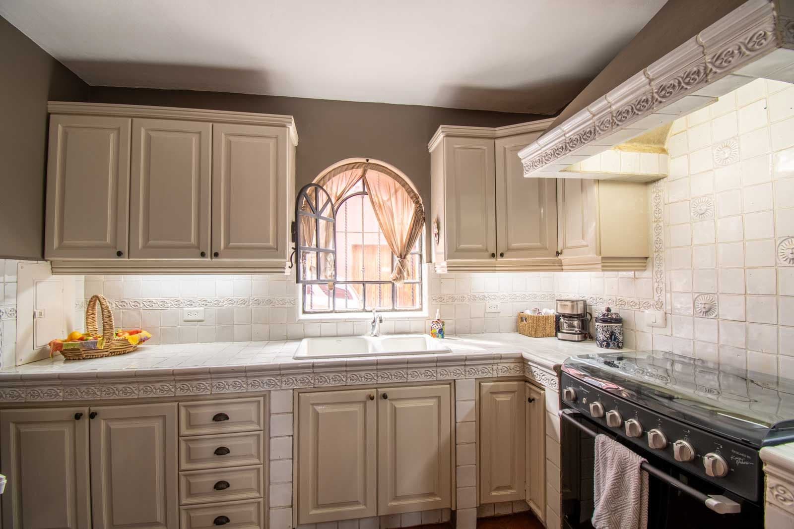 Casa Suerte — Balcones, San Miguel de Allende — photo 8 — elegant traditional kitchen, abundant natural light