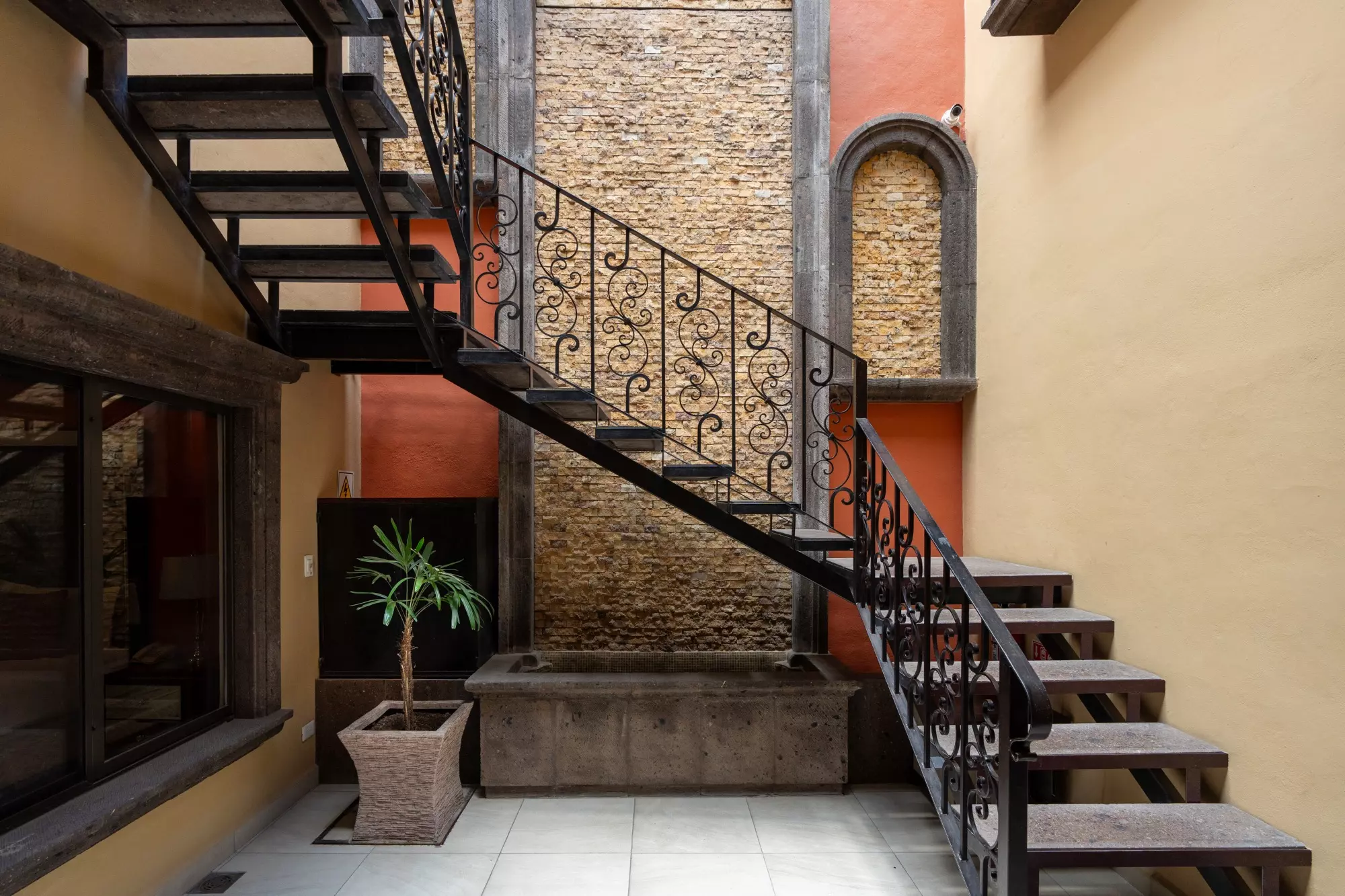 Hotel Centro — Centro, San Miguel de Allende — photo 31 — charming courtyard with wrought iron elegance