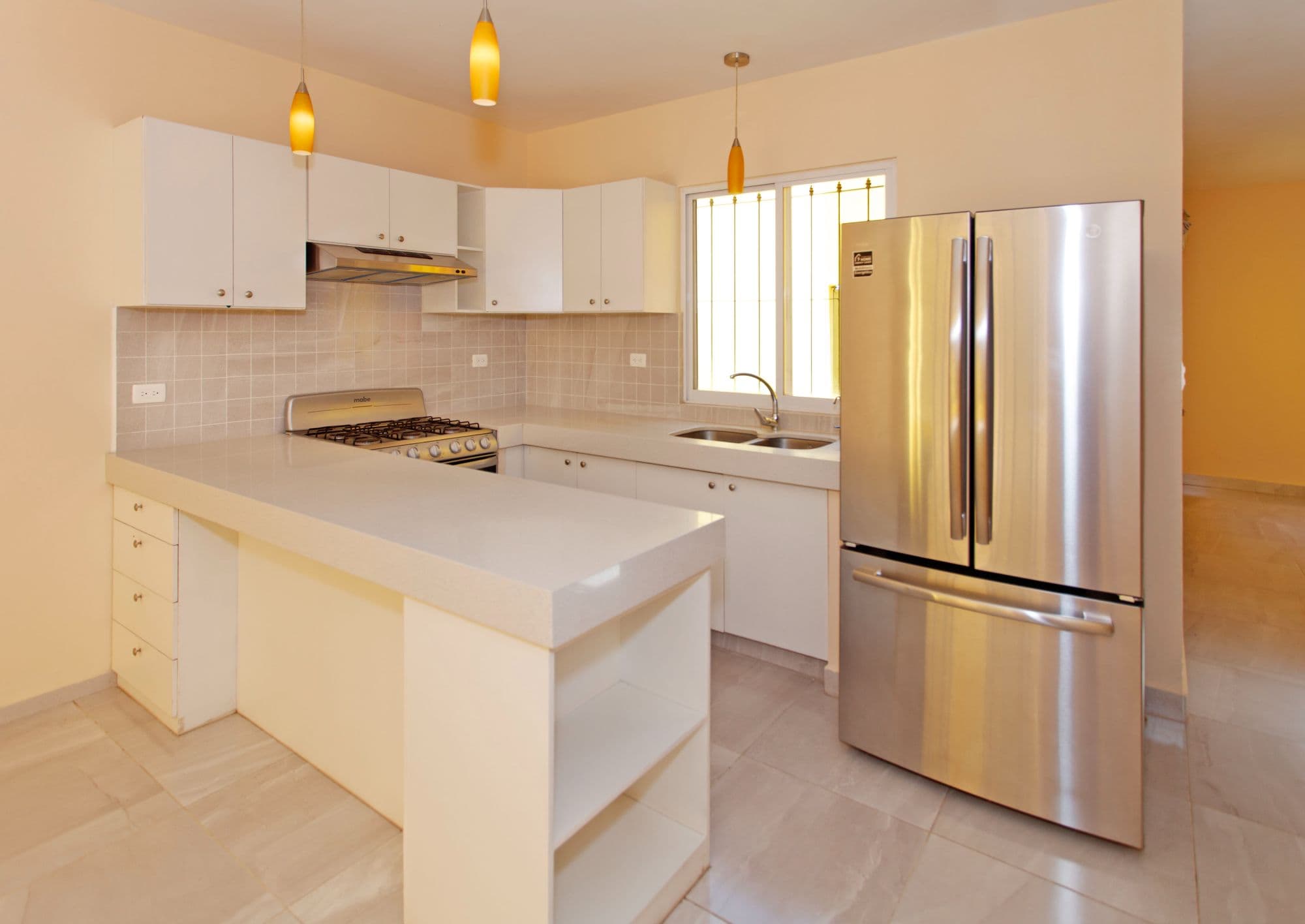 Casa Lucero 17A in La Lejona for sale in San Miguel de Allende — La Lejona, San Miguel de Allende — photo 7 — bright modern kitchen, stainless finishes
