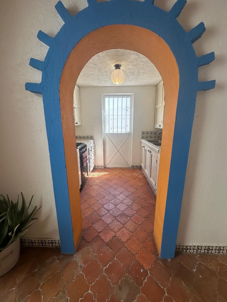 Casa Guadiana Original — Guadiana, San Miguel de Allende — photo 3 — charming arched entry, authentic mexican kitchen