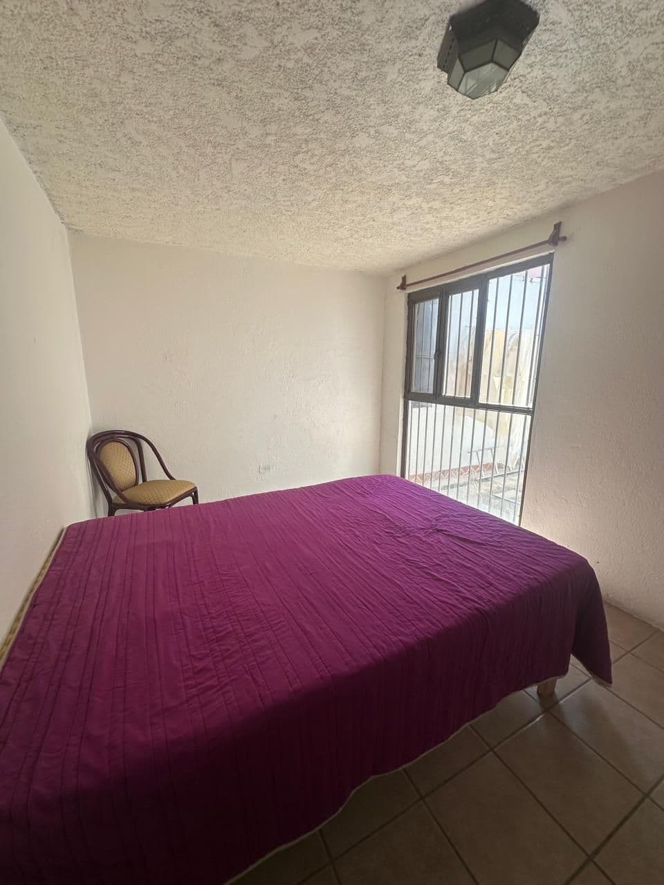 Casa Guadiana Original — Guadiana, San Miguel de Allende — photo 8 — bright bedroom, charming balcony views