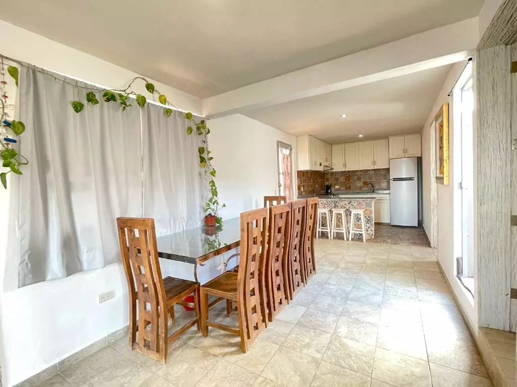Condominio Allende — Aurora, San Miguel de Allende — photo 5 — bright, airy dining kitchen with character