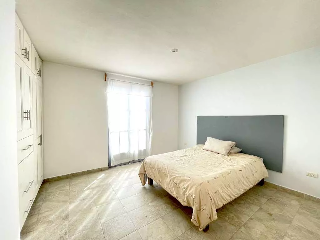 Condominio Allende — Aurora, San Miguel de Allende — photo 6 — serene primary suite, luminous natural light