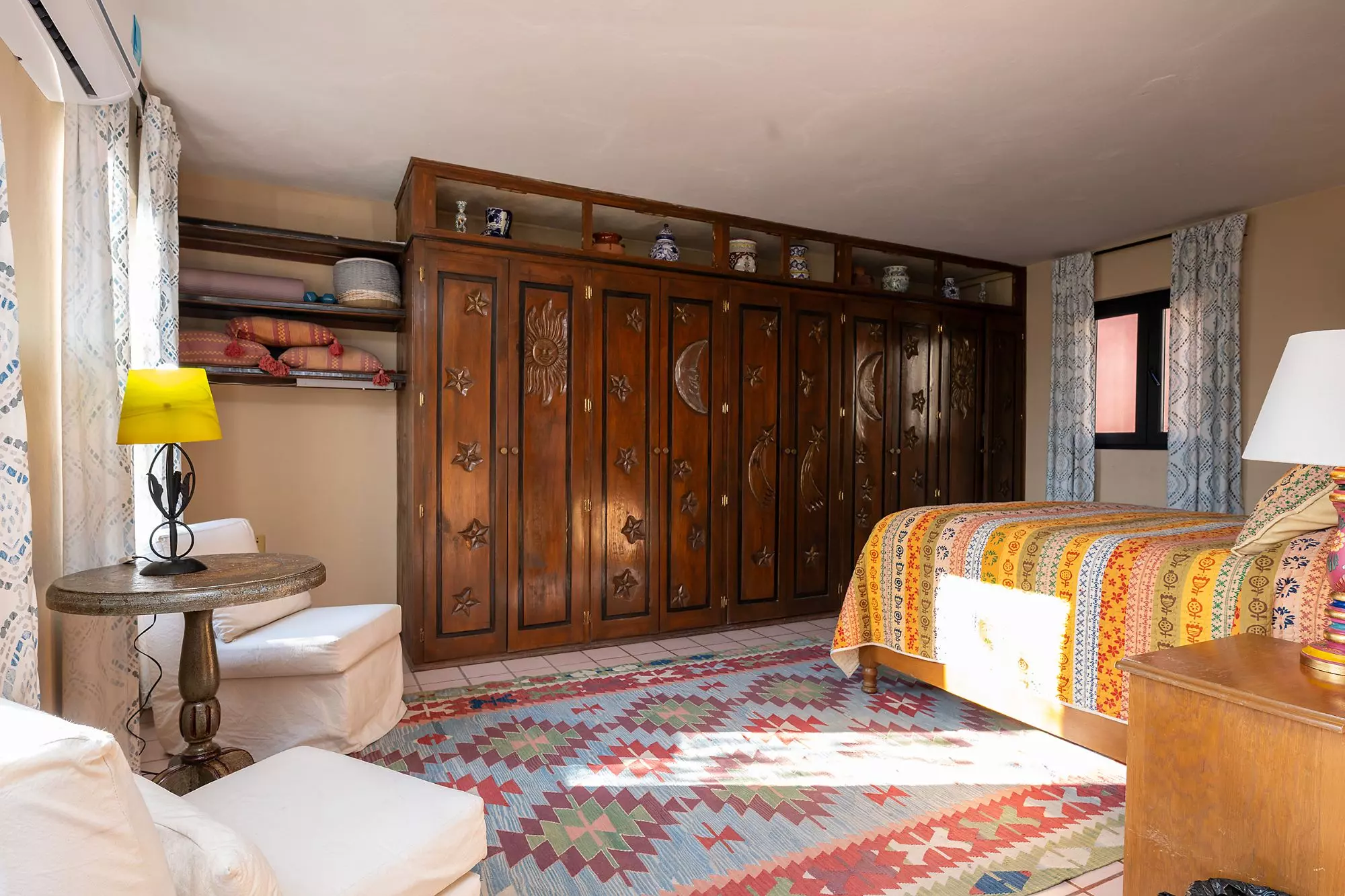 Casa Corazón — Valle del Maíz, San Miguel de Allende — photo 12 — spacious master suite, carved wood elegance