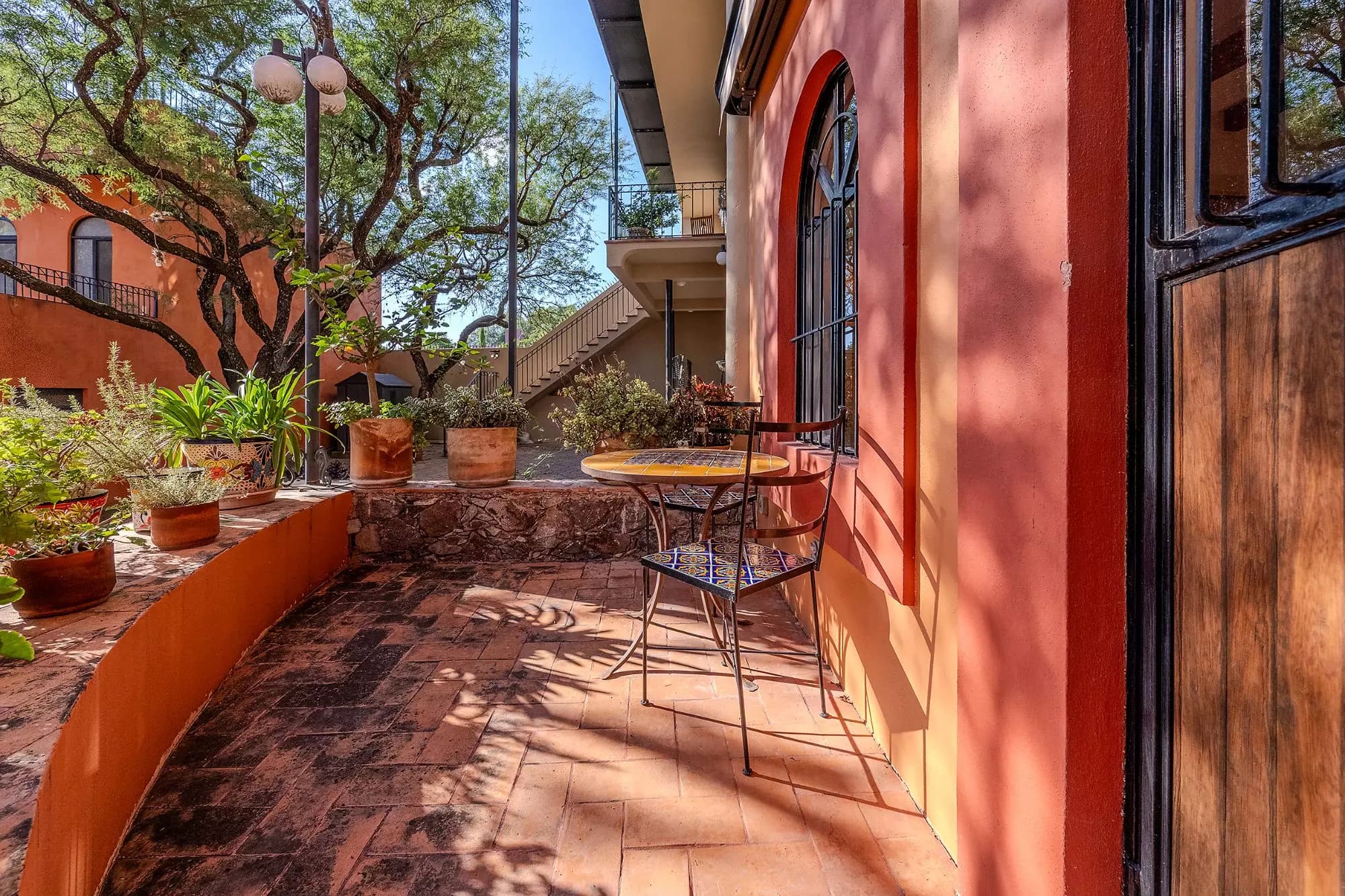 Casa Corazón — Valle del Maíz, San Miguel de Allende — photo 20 — charming courtyard with dappled sunlight