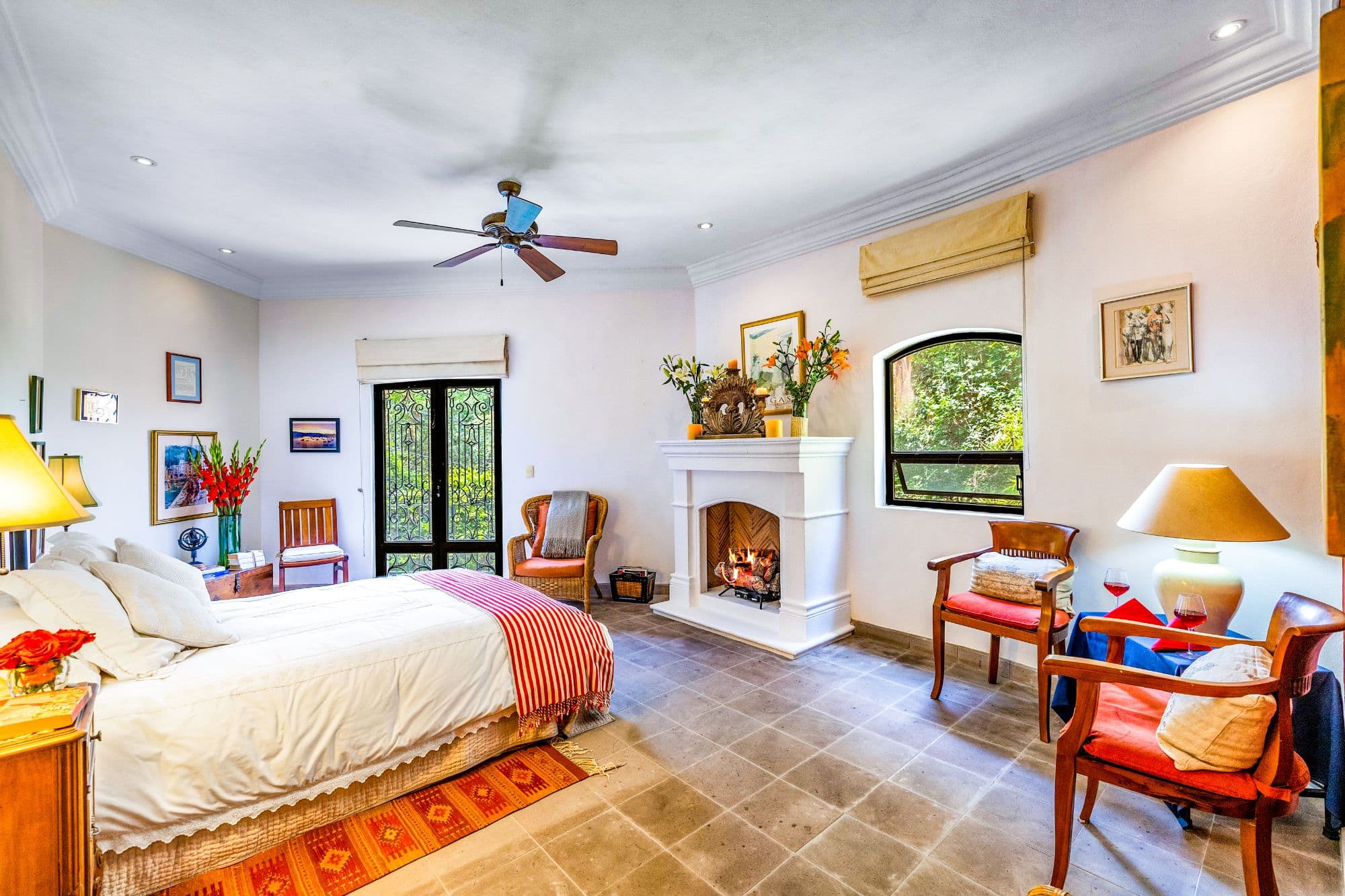 Casa Cascada — Ojo de Agua, San Miguel de Allende — photo 15 — luxurious master suite with fireplace charm