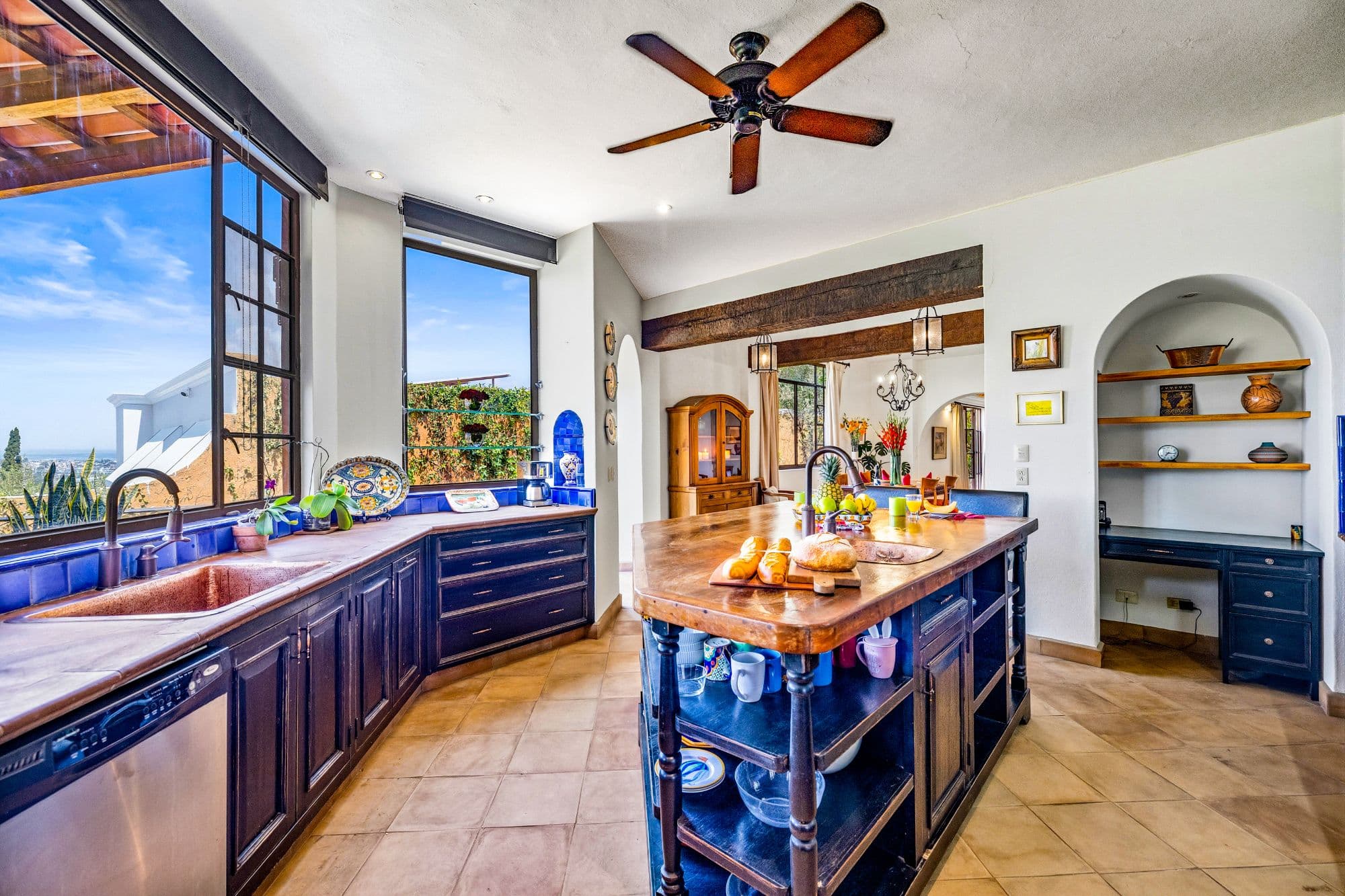 Casa Cascada — Ojo de Agua, San Miguel de Allende — photo 5 — stunning chef's kitchen, azure accents, panoramic views