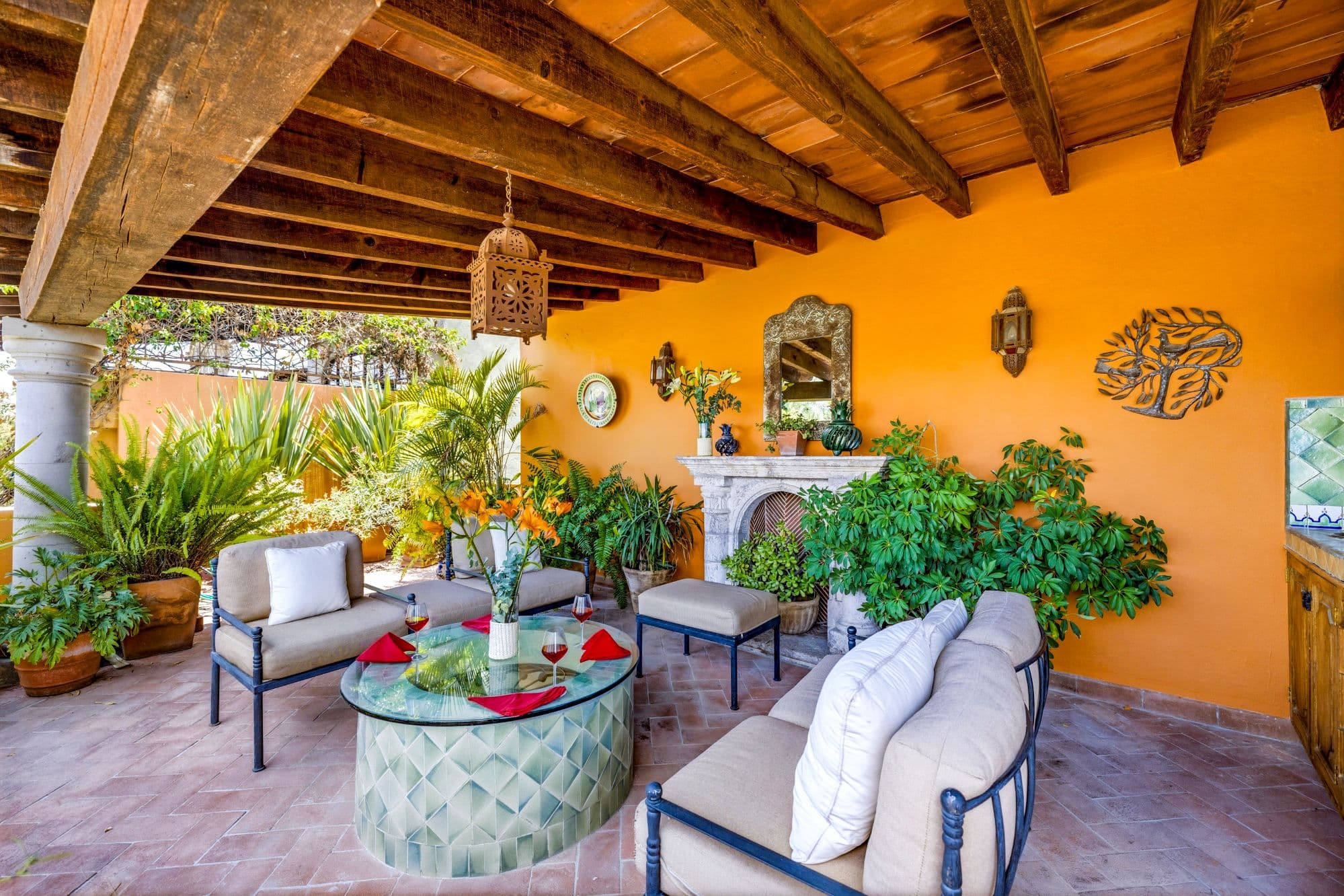 Casa Cascada — Ojo de Agua, San Miguel de Allende — photo 17 — vibrant covered terrace, lush tropical garden