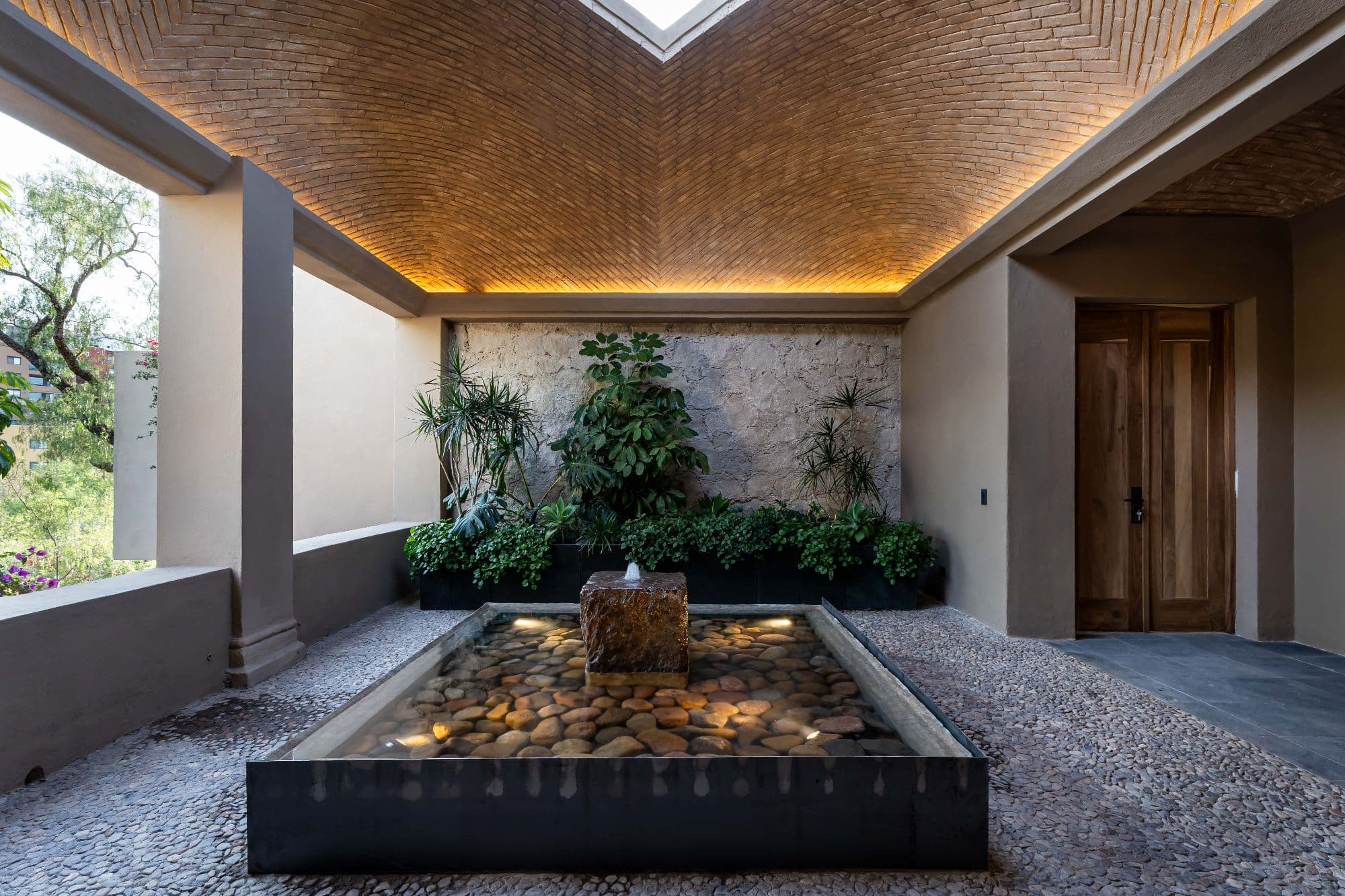 Casa Fuentes — Atascadero (Arcos de San Miguel), San Miguel de Allende — photo 3 — serene courtyard with sculptural water feature