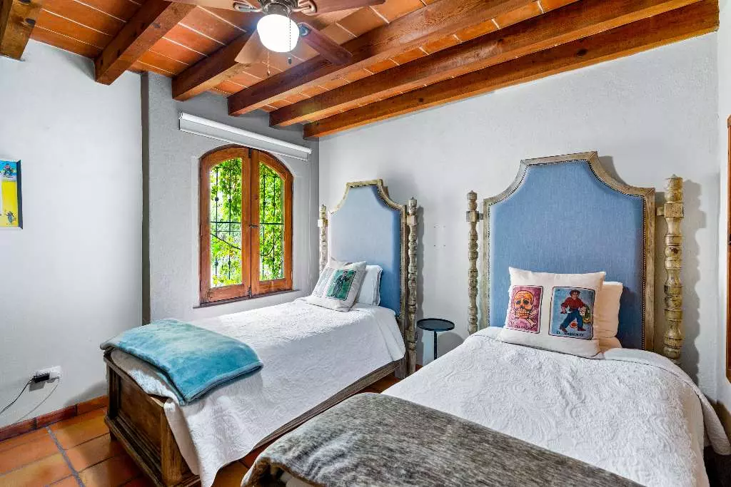 Casa Roka En El Obraje — El Obraje, San Miguel de Allende — photo 3 — rustic-elegant bedroom, soaring wooden beams