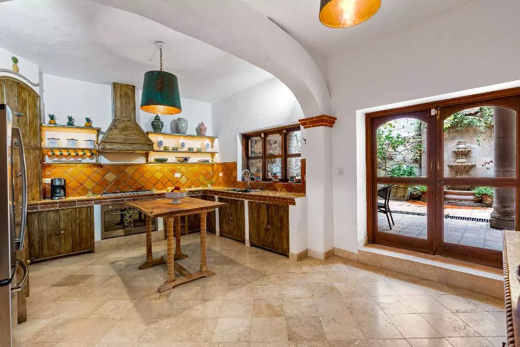 Casa Roka En El Obraje — El Obraje, San Miguel de Allende — photo 10 — charming traditional kitchen, golden light