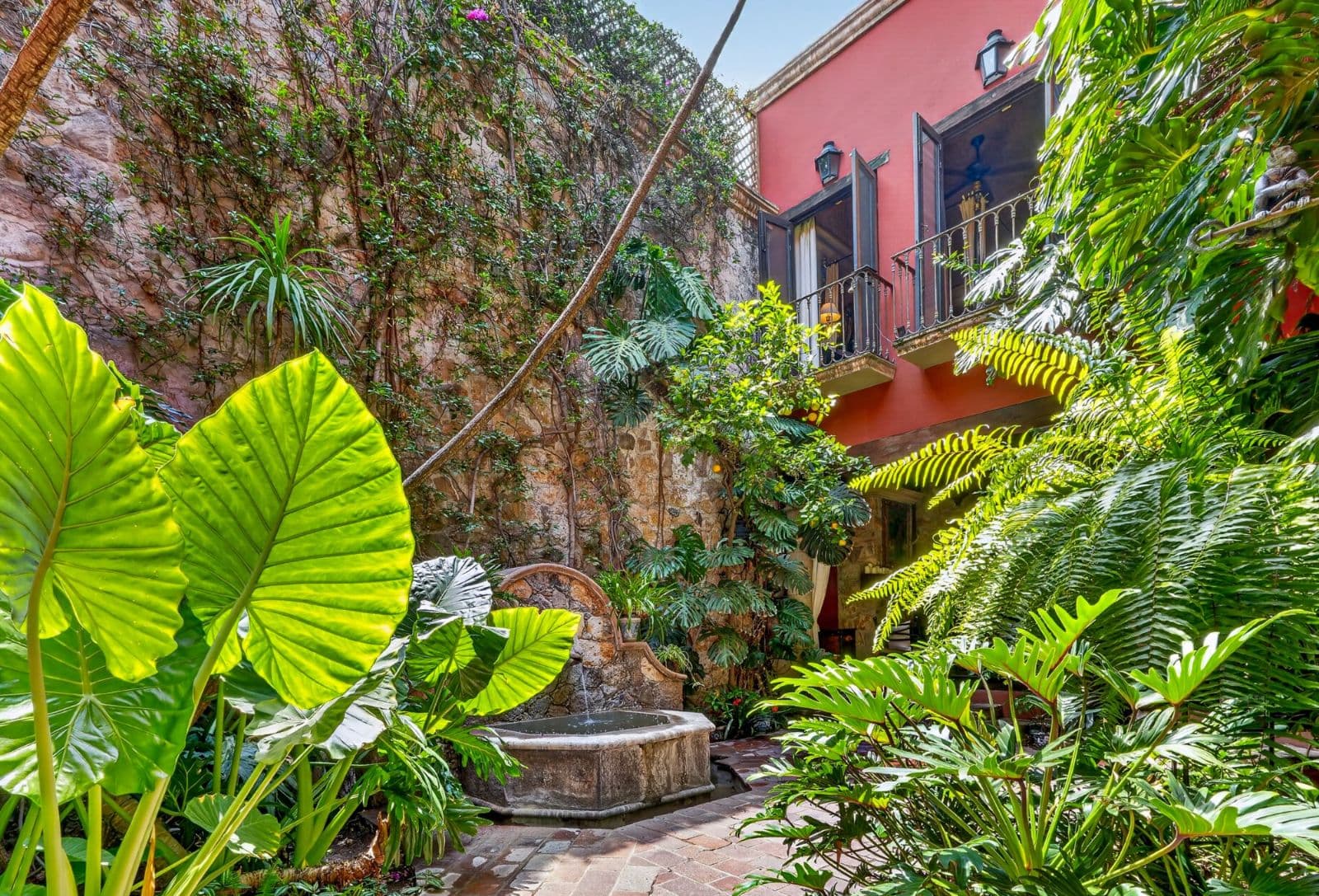 Villa Escondida — Centro, San Miguel de Allende — photo 2 — enchanting courtyard oasis, lush tropical garden