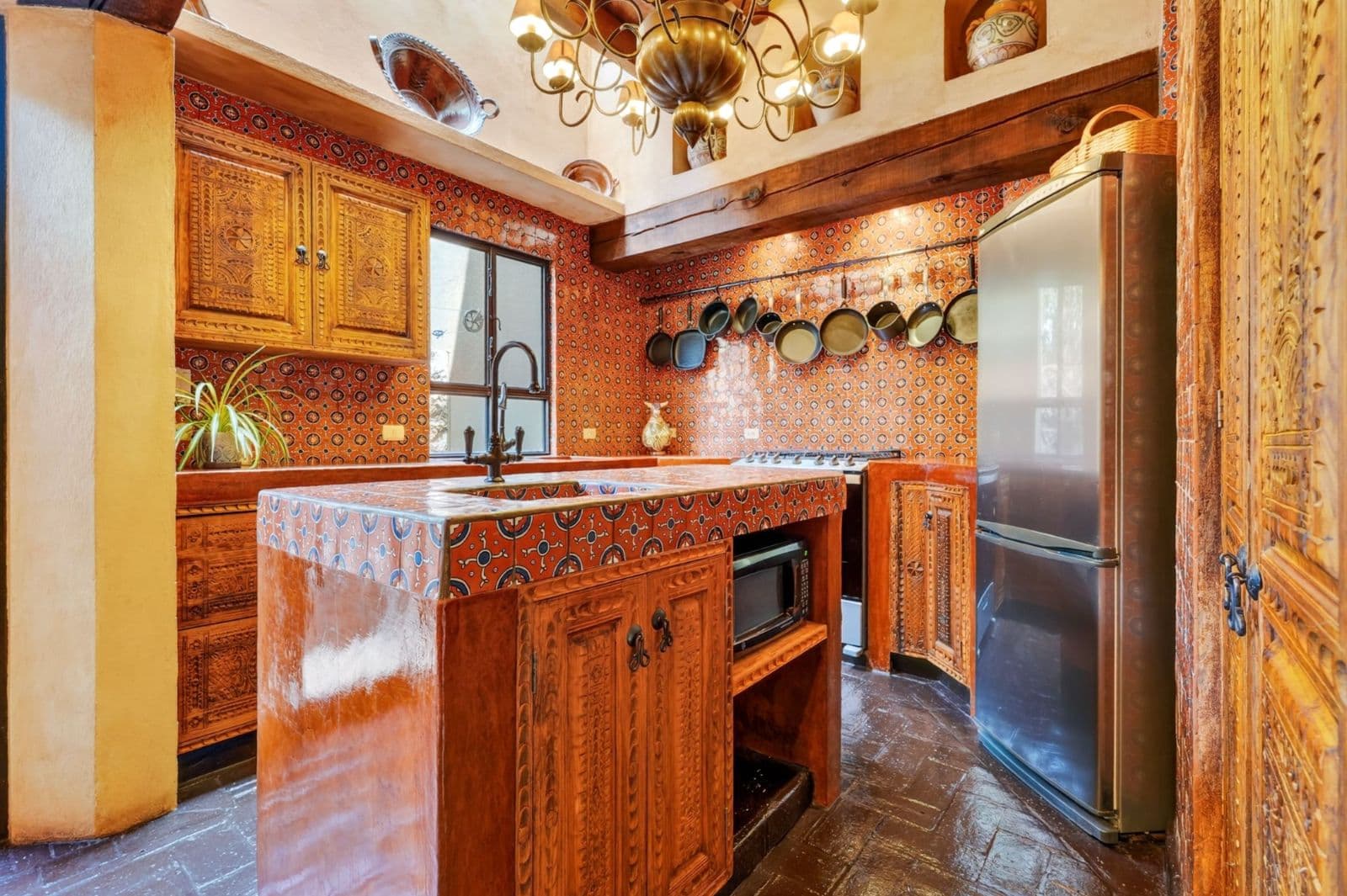Villa Escondida — Centro, San Miguel de Allende — photo 9 — artisanal mexican kitchen, warmly appointed