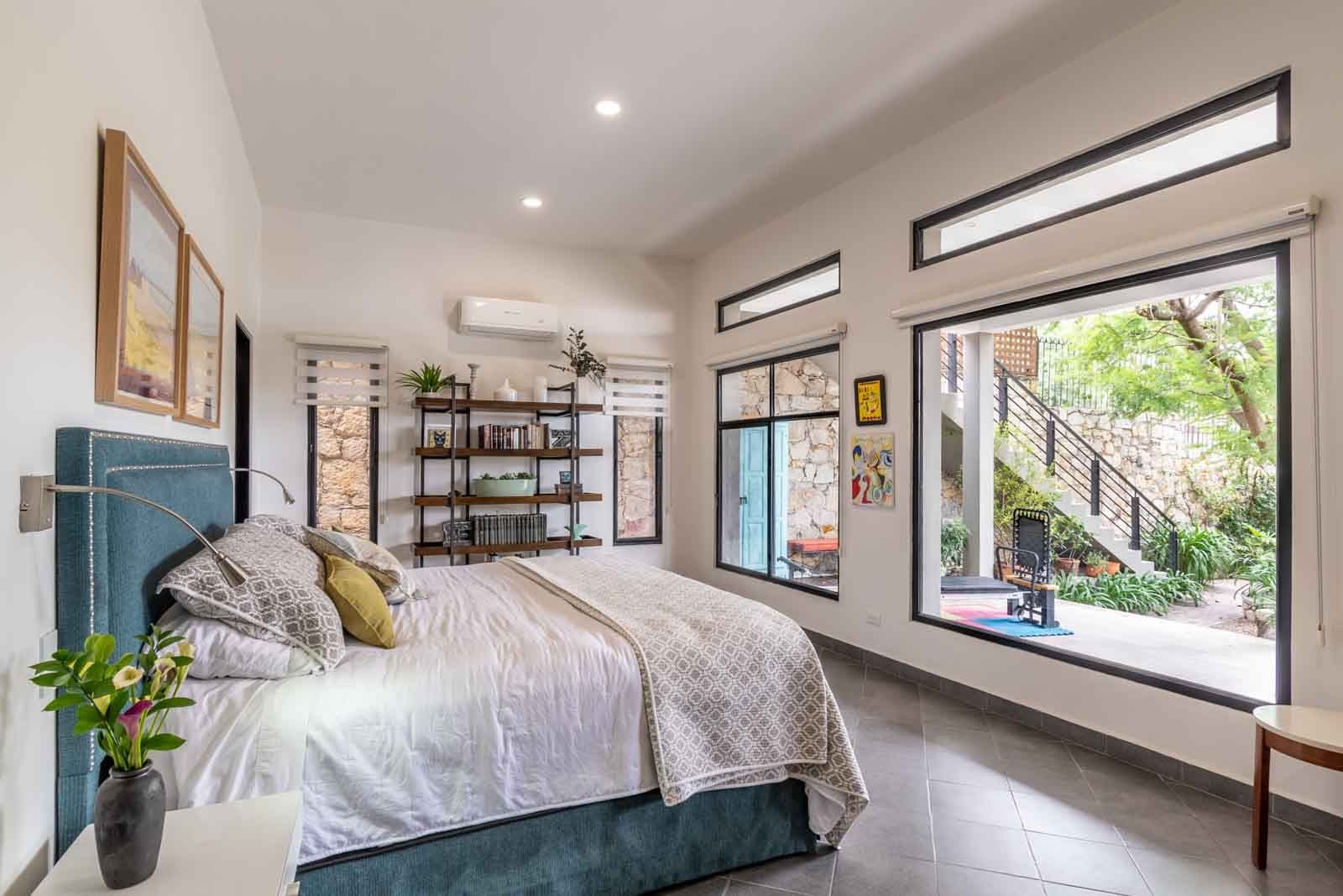 Contemporary Obraje — El Obraje, San Miguel de Allende — photo 8 — luminous master suite with garden views