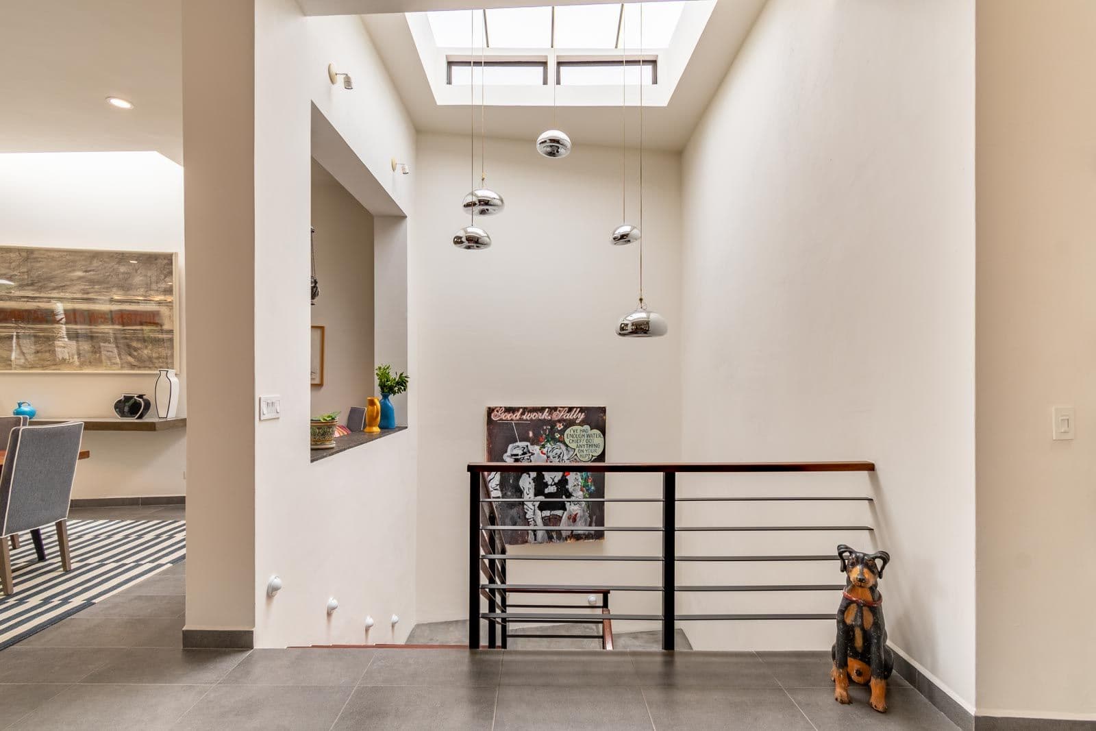 Contemporary Obraje — El Obraje, San Miguel de Allende — photo 14 — bright, modern stairwell with skylights