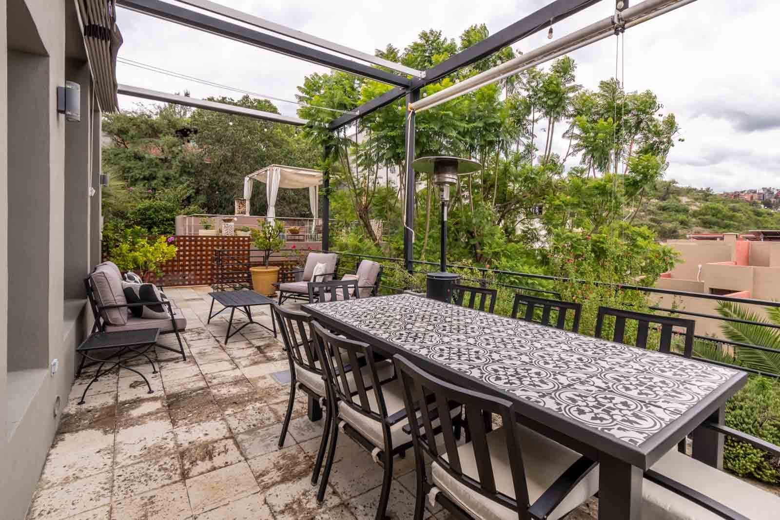Contemporary Obraje — El Obraje, San Miguel de Allende — photo 23 — elevated entertaining with panoramic garden vistas