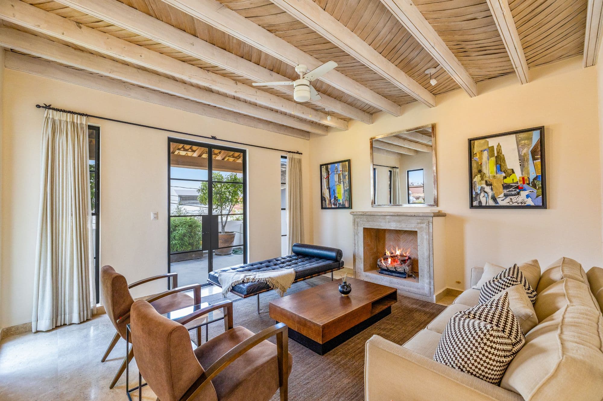 CASA PINO — Guadalupe, San Miguel de Allende — photo 16 — luminous living room, rustic beams, fireplace