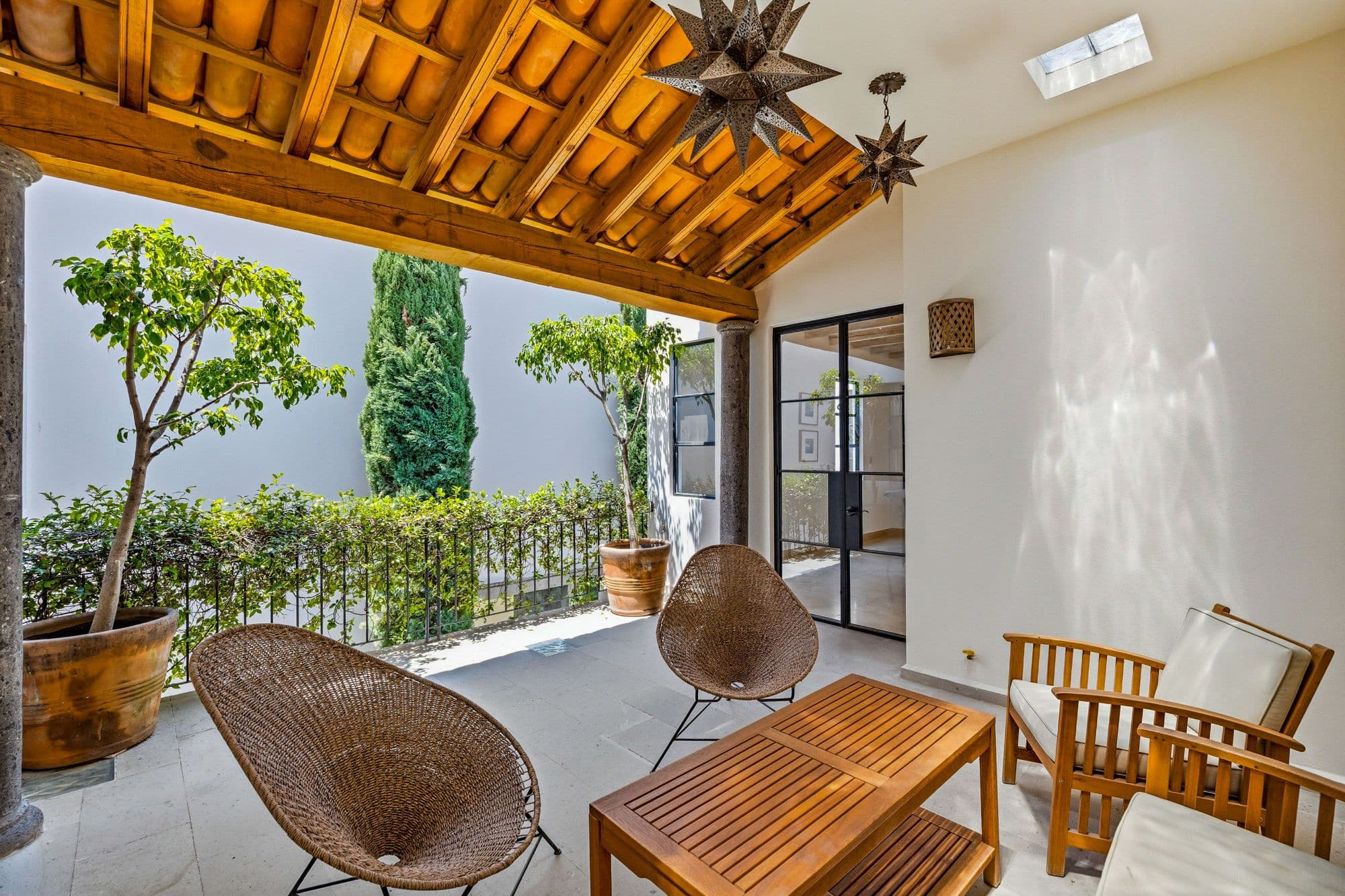 CASA PINO — Guadalupe, San Miguel de Allende — photo 23 — serene covered terrace with garden views