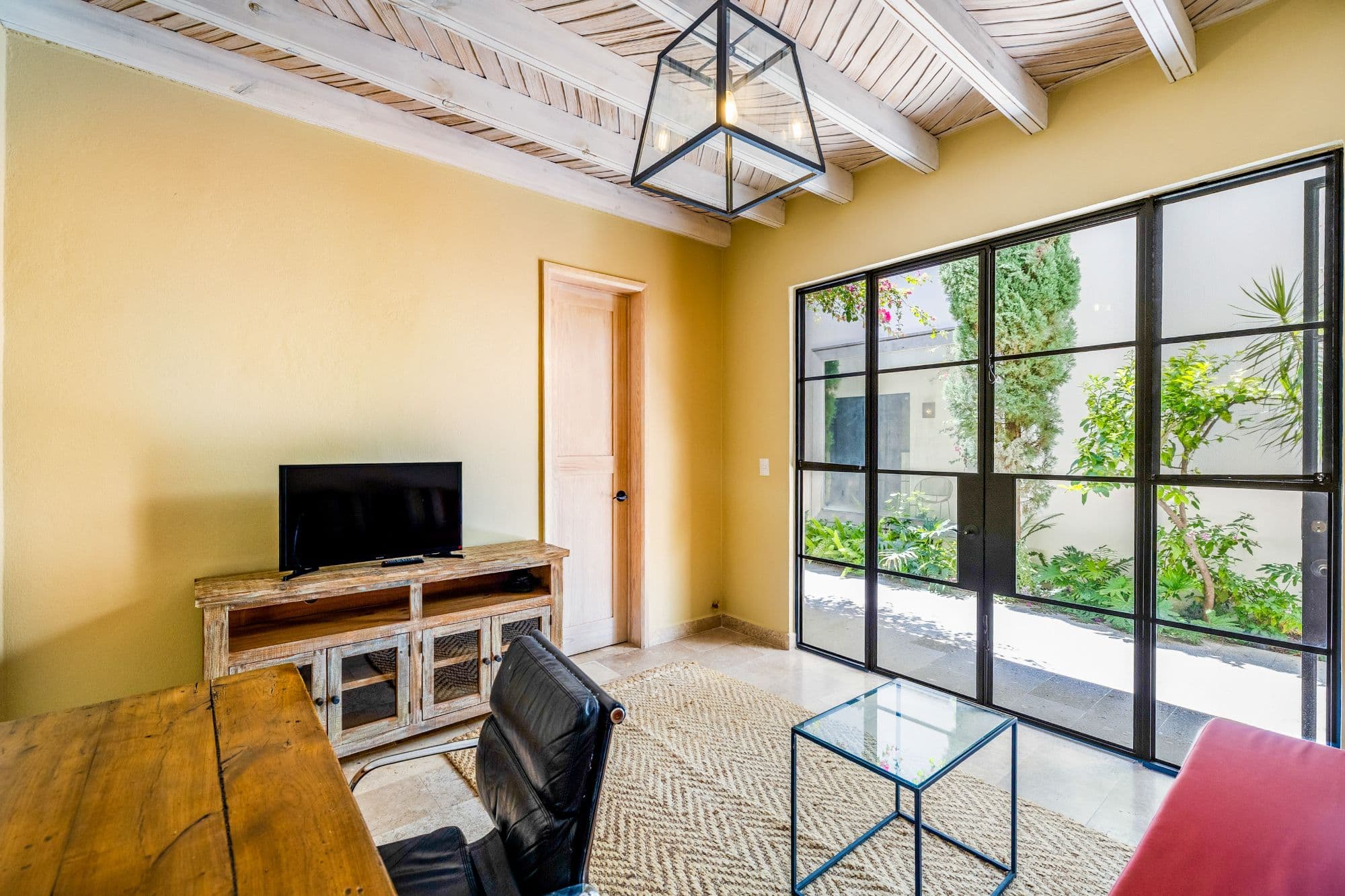 CASA PINO — Guadalupe, San Miguel de Allende — photo 14 — sunlit living room, rustic-modern charm