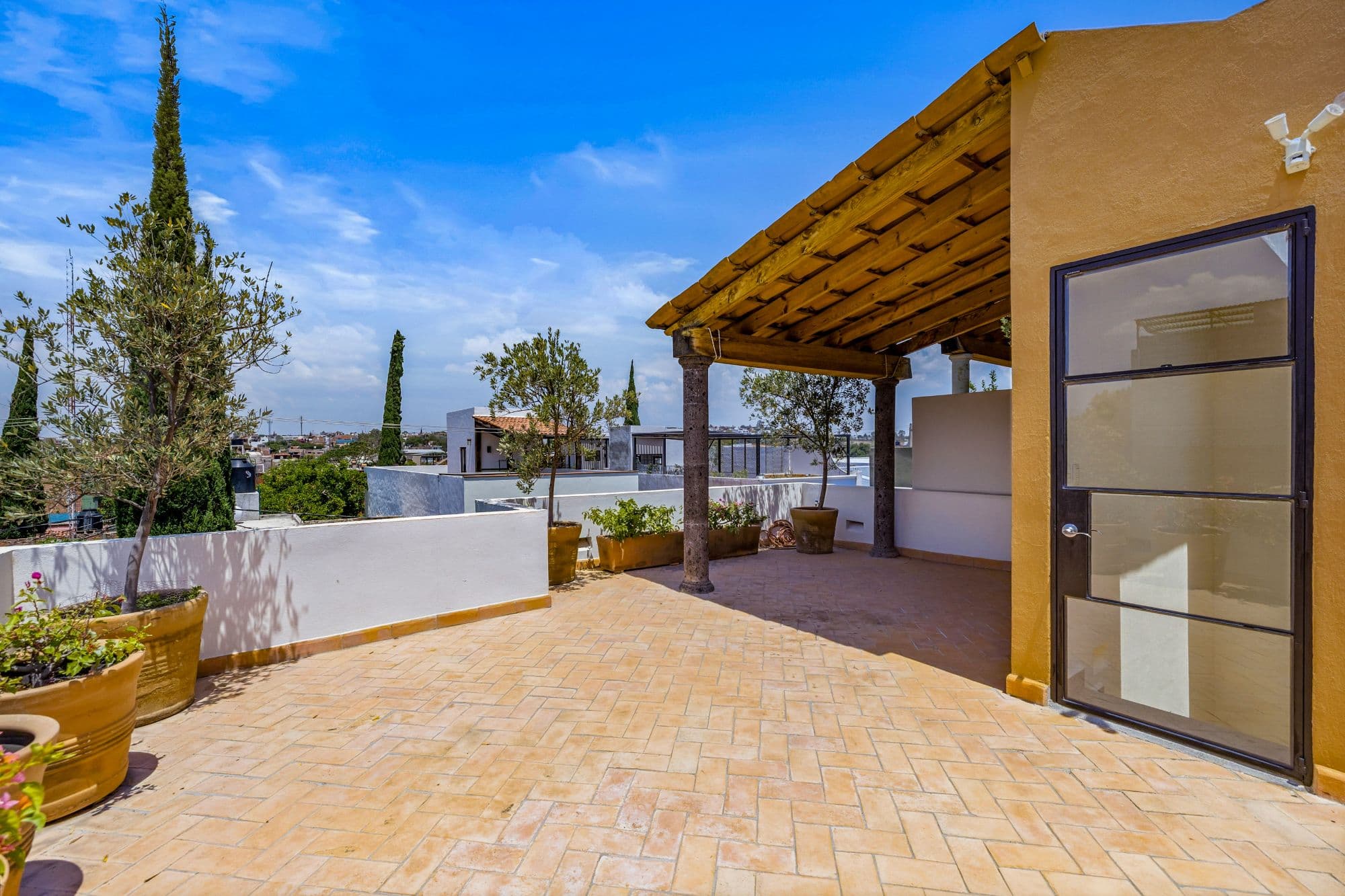 CASA PINO — Guadalupe, San Miguel de Allende — photo 29 — sunlit rooftop terrace, breathtaking skyline views