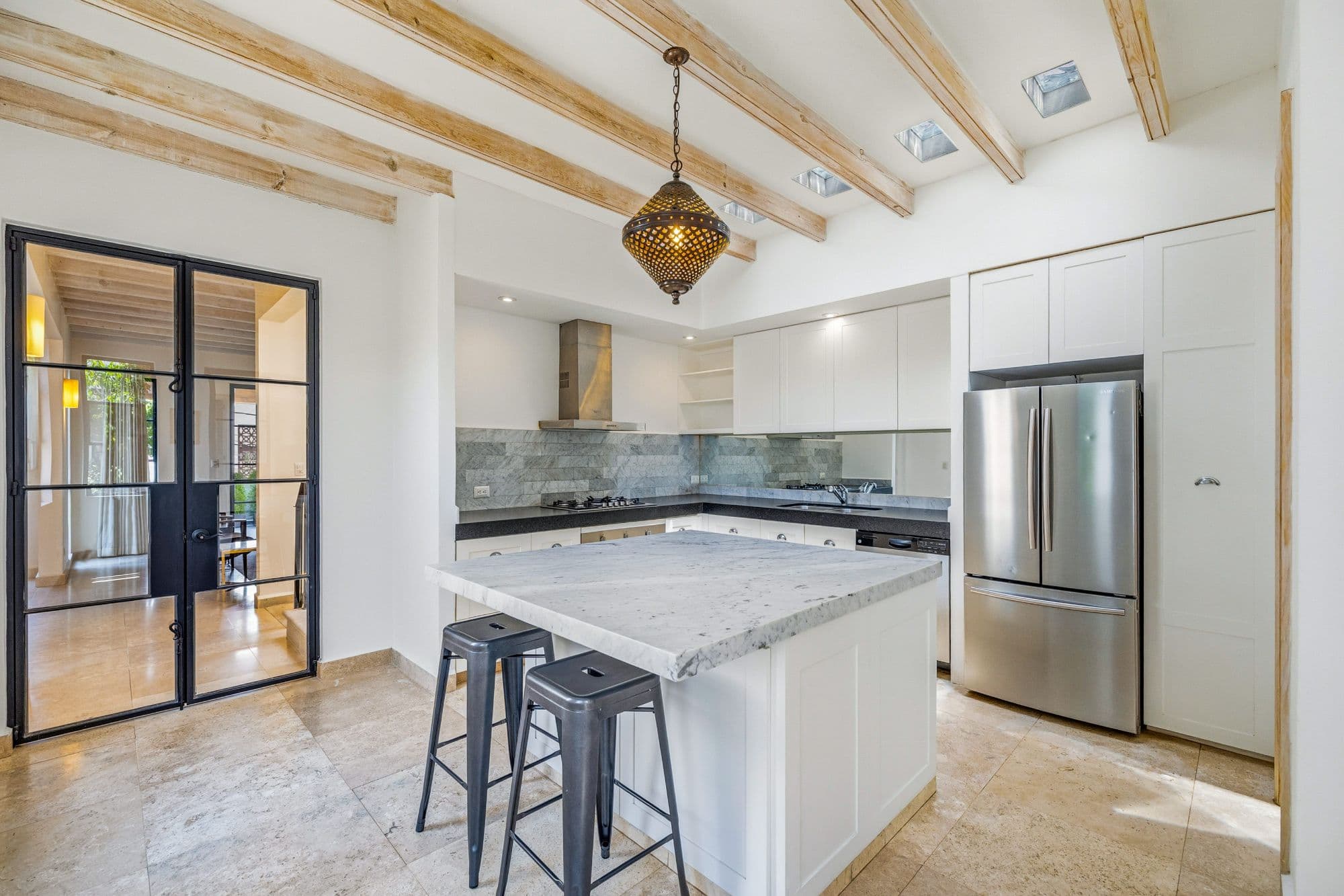 CASA PINO — Guadalupe, San Miguel de Allende — photo 19 — contemporary kitchen, soaring beamed ceilings
