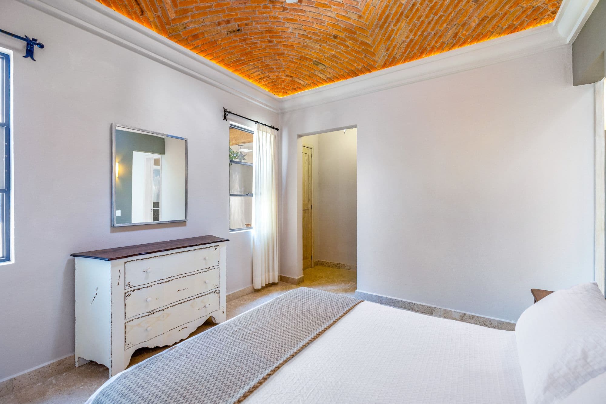 CASA PINO — Guadalupe, San Miguel de Allende — photo 26 — luminous master suite, artisanal ceiling details