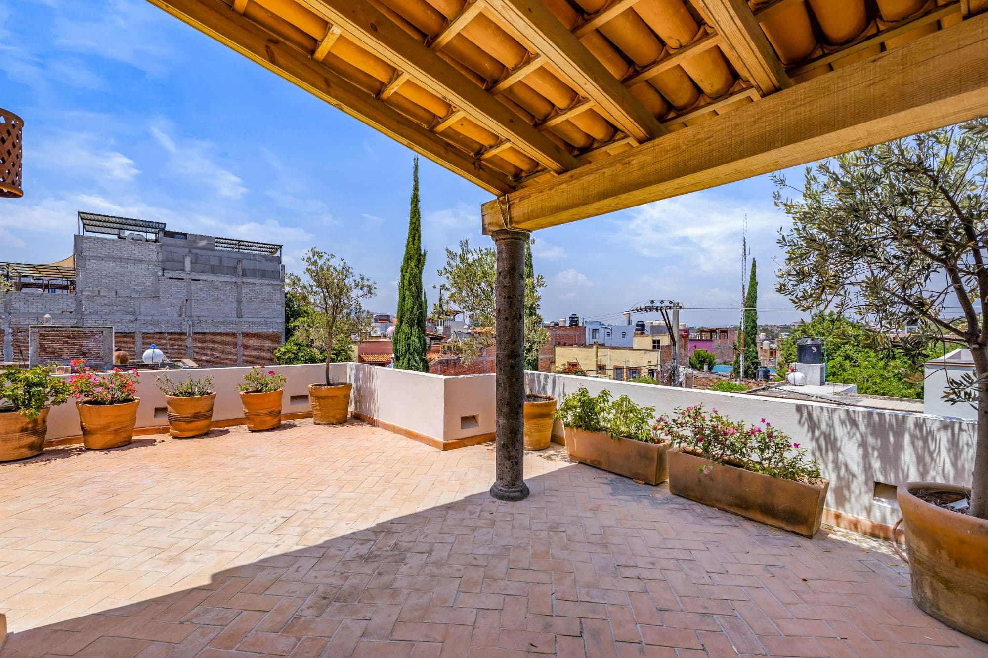 CASA PINO — Guadalupe, San Miguel de Allende — photo 30 — expansive rooftop terrace, breathtaking cityscape views